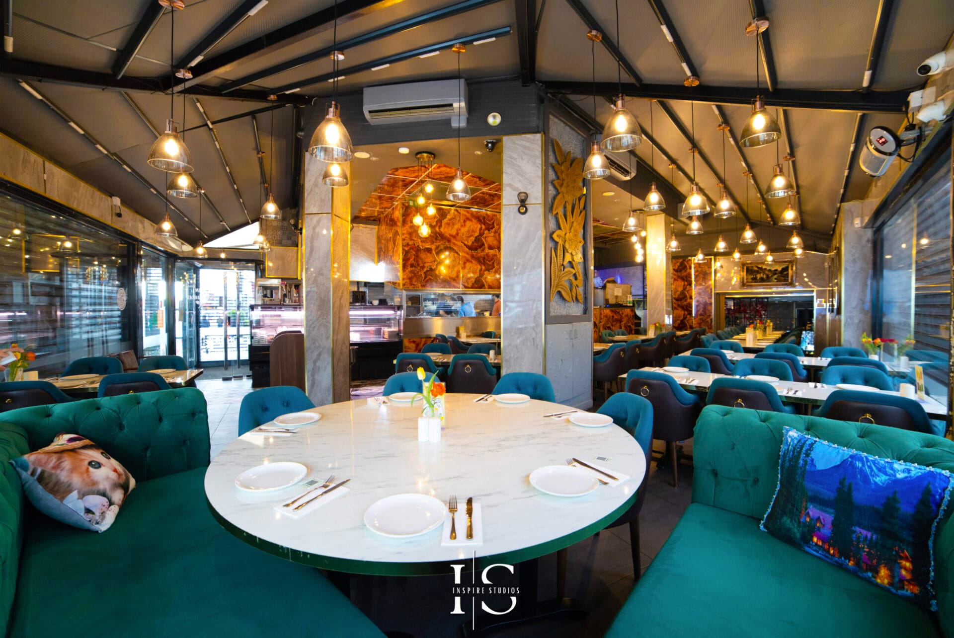 Professional interior photography of Gunes Restaurant dining area in Walthamstow, London by Inspire Studios, showcasing Turkish restaurant design and seating layout.