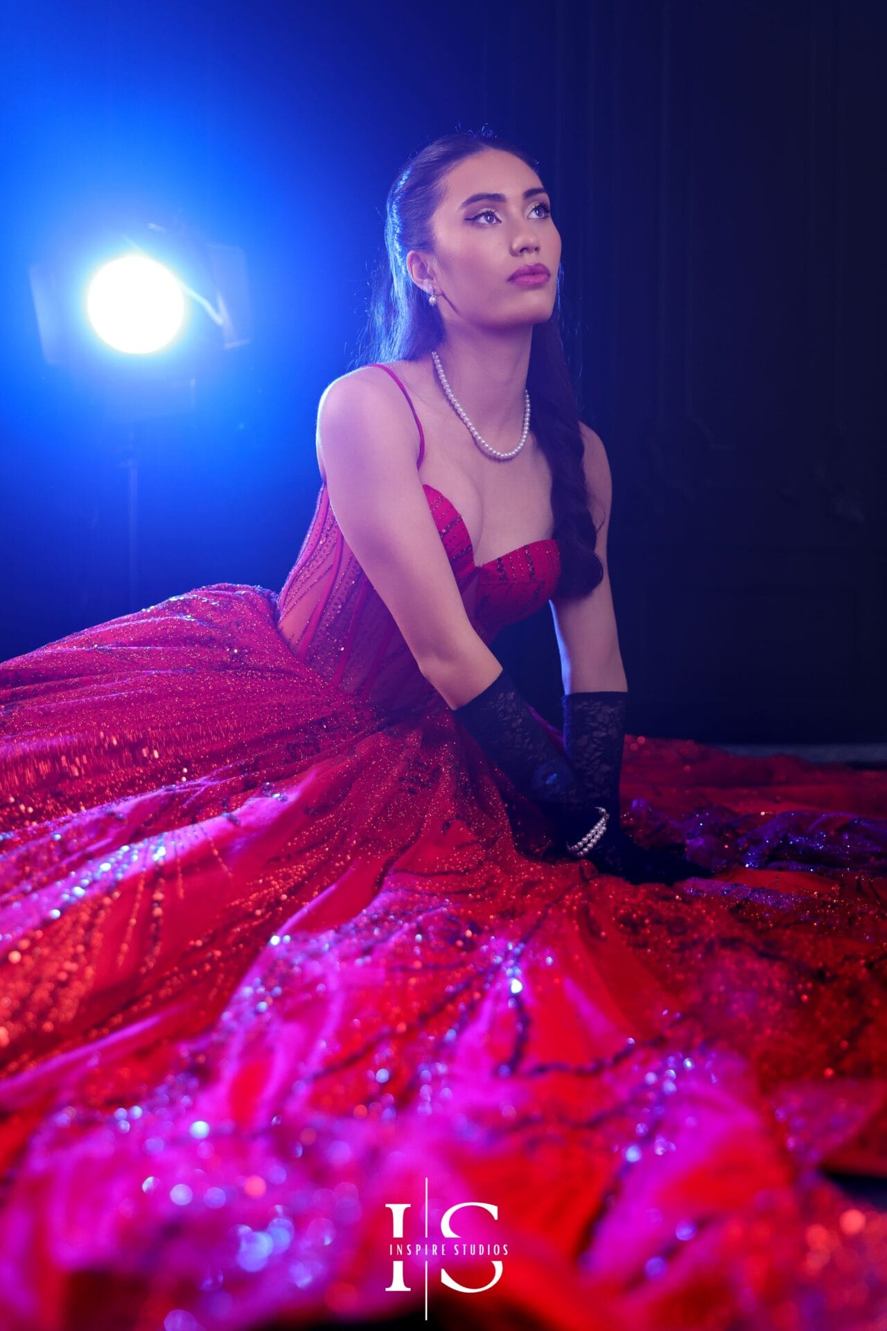 Filipino 18th birthday debut photoshoot in London studio with luxury gown and professional lighting.