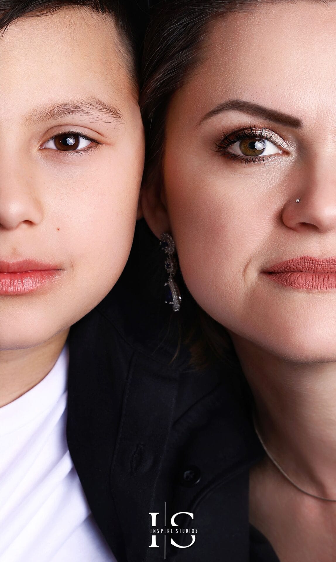 Close up mother and son portrait taken during a professional family photoshoot in a London photography studio.