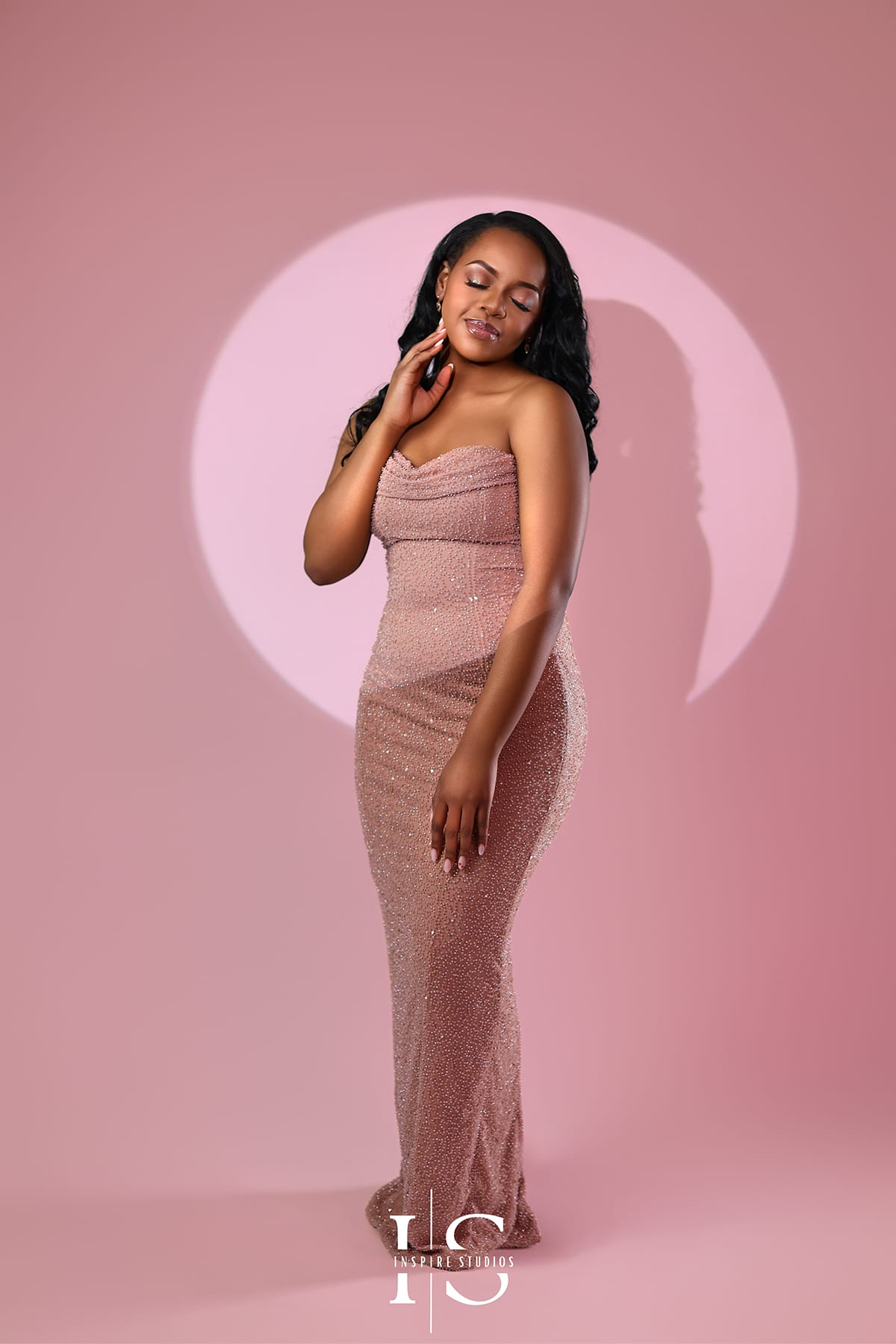 Luxury pink backdrop studio birthday photoshoot with elegant styling and professional lighting setup.