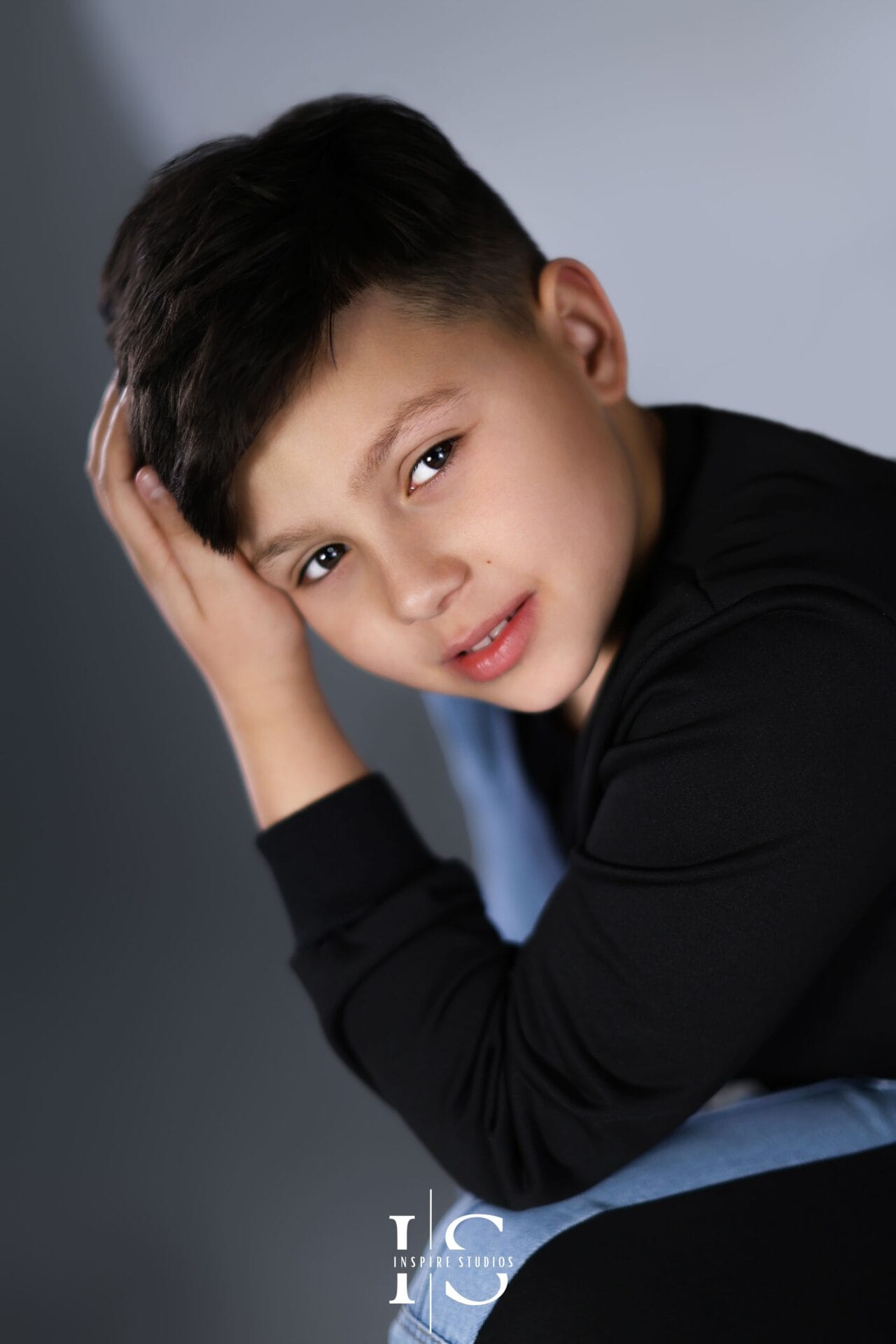 10th birthday photoshoot ideas for boy in London studio with creative setup