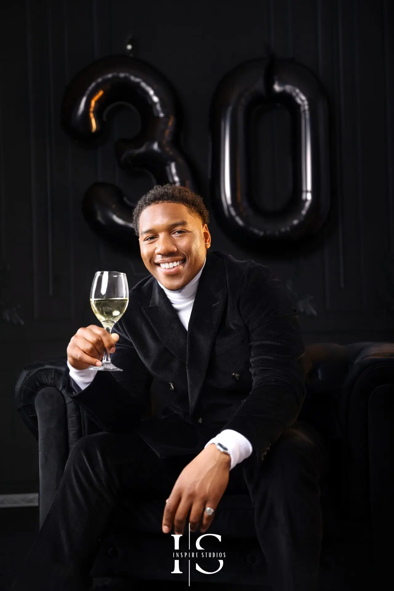 Creative men's birthday photoshoot ideas with balloons and studio lighting