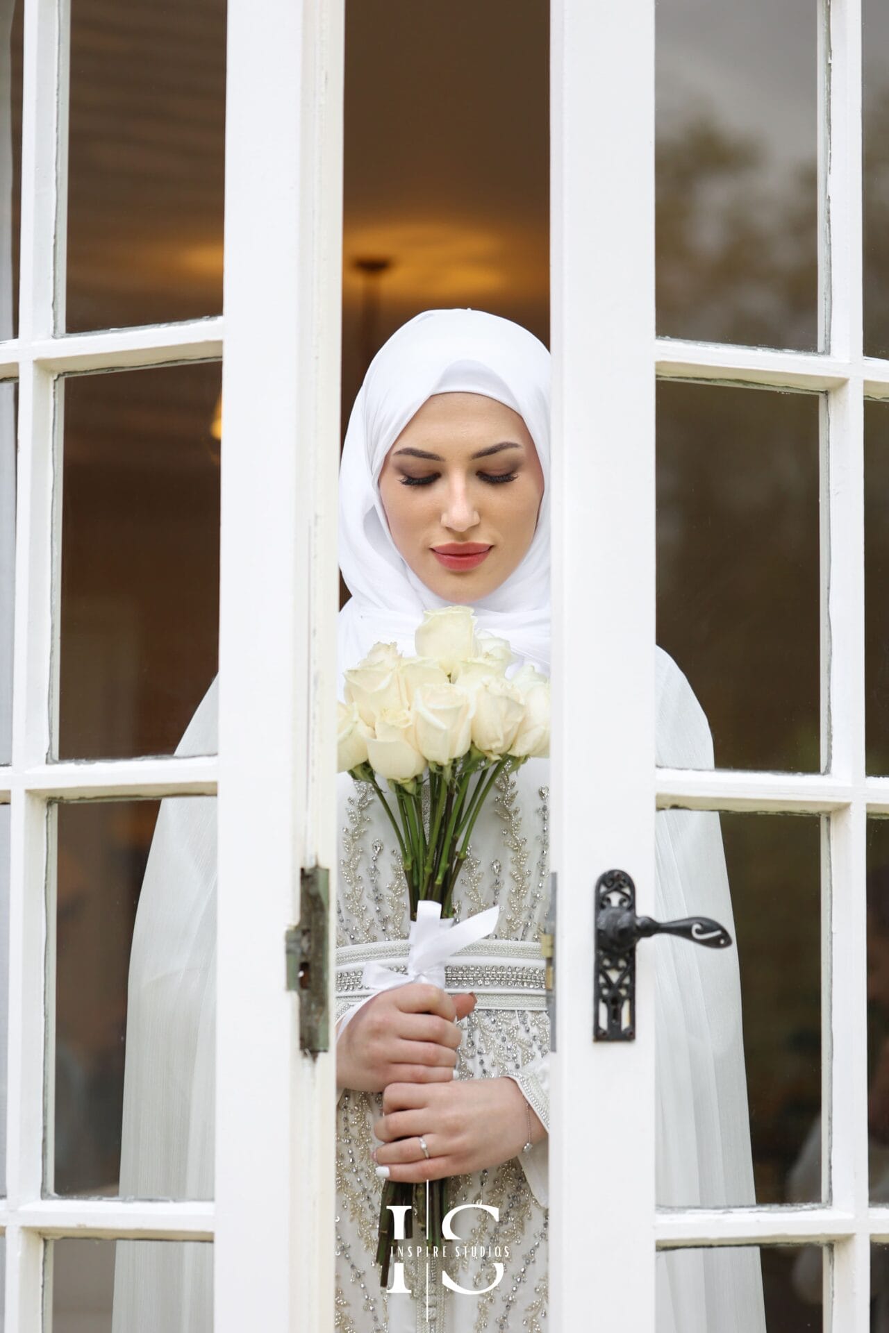 female photographer capturing Nikkah wedding at Central London Mosque London