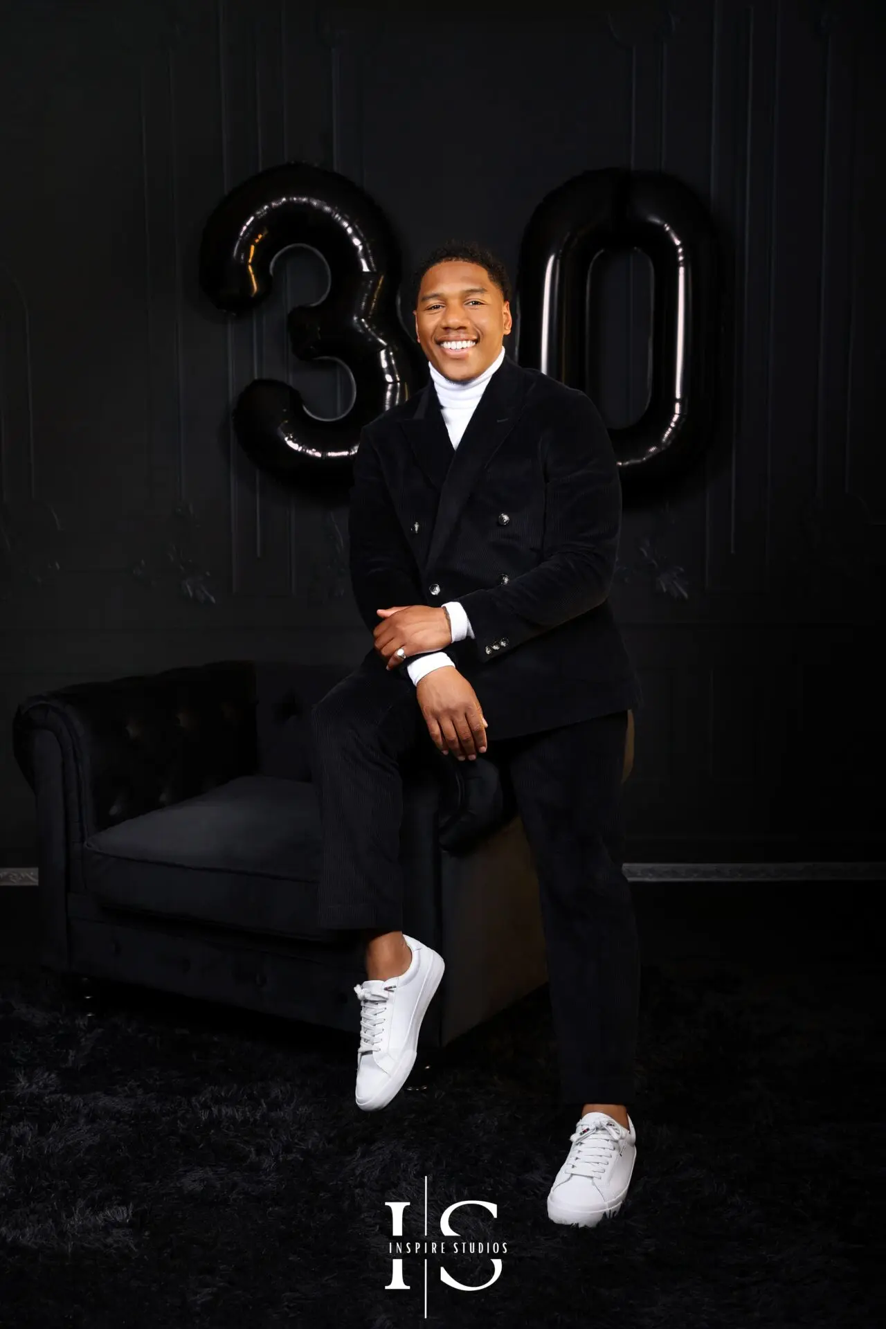 luxury mens birthday photoshoot with number balloons and modern outfit portrait