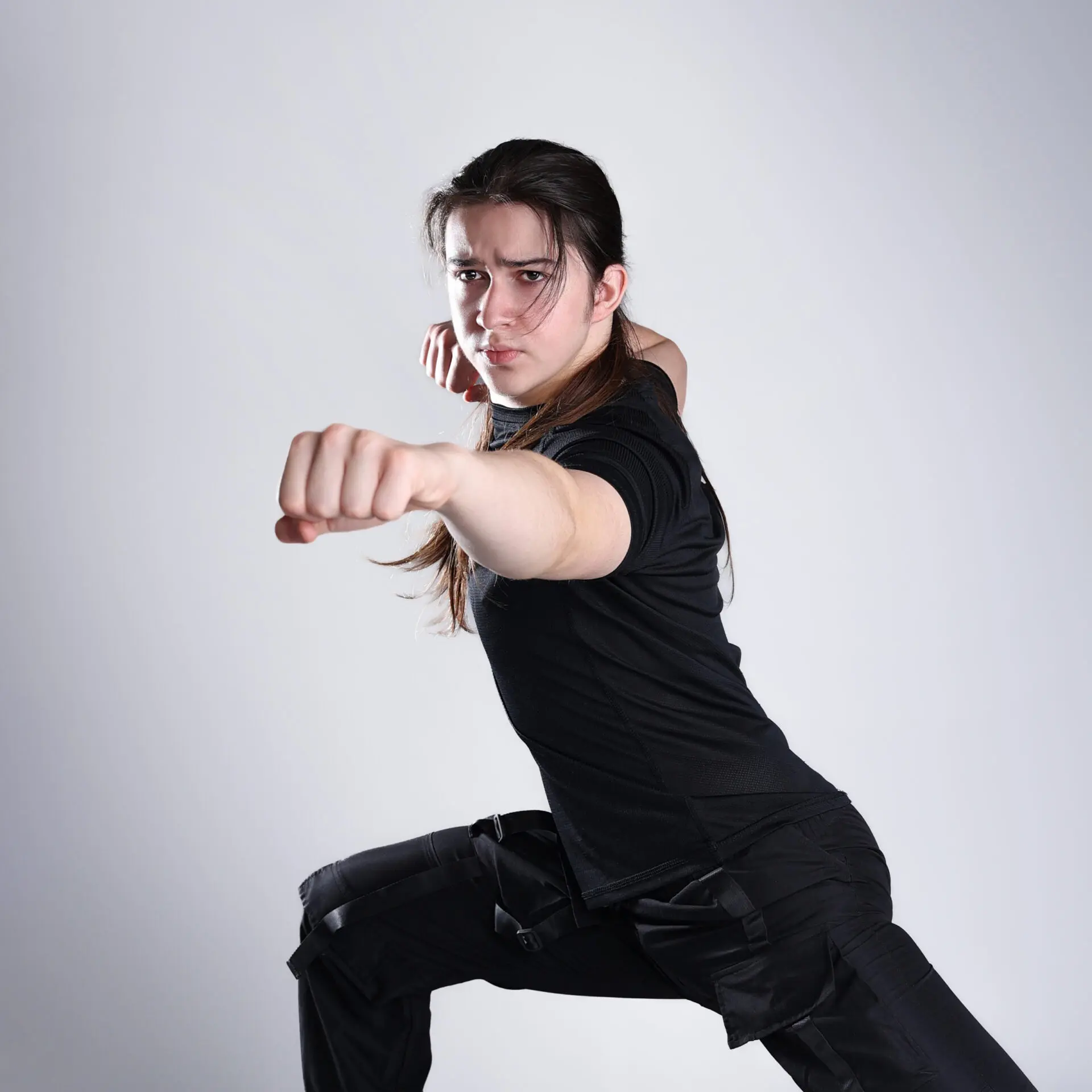 martial arts portfolio photoshoot session in London studio with athlete posing in uniform