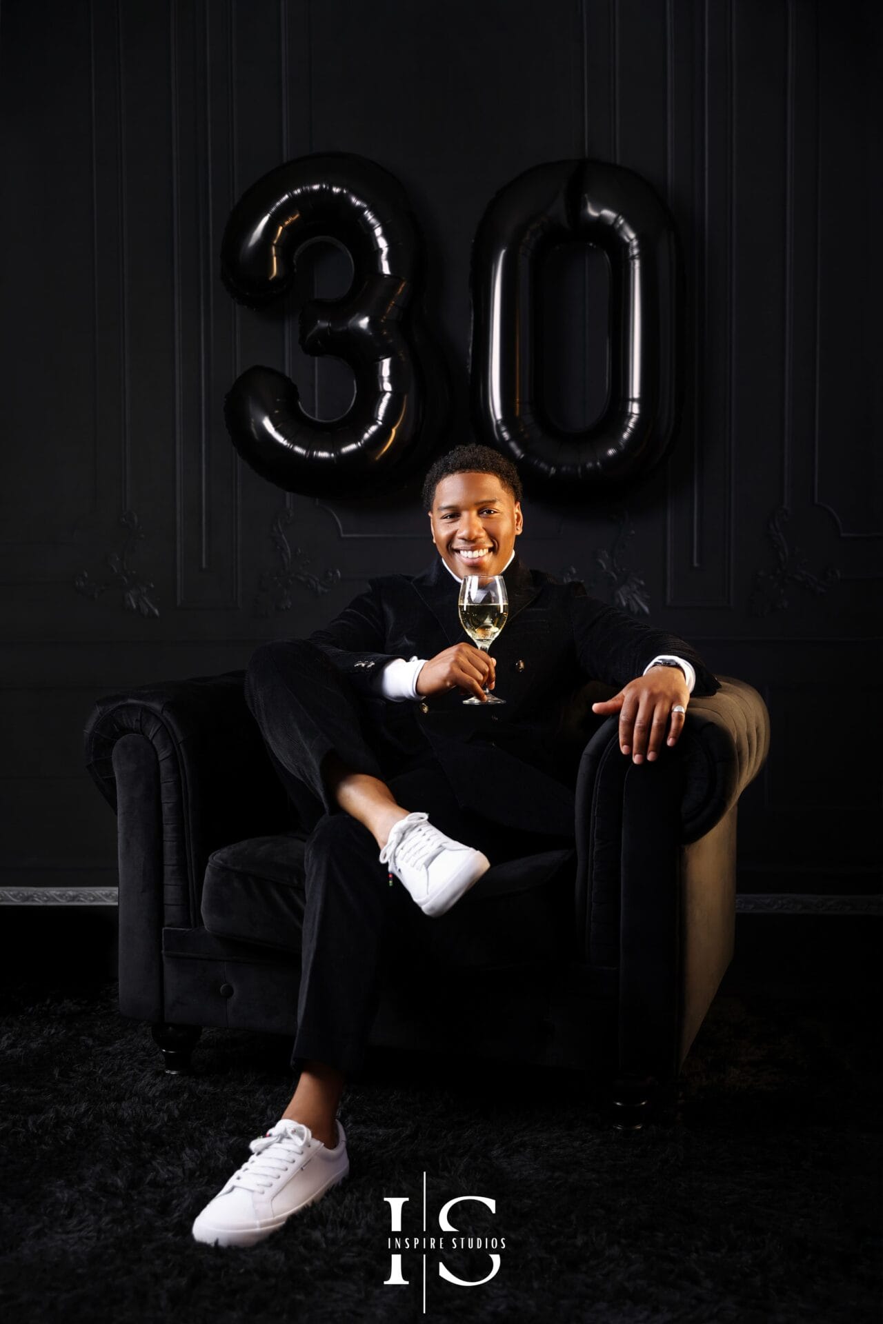 mens birthday photoshoot black theme studio portrait with dark background