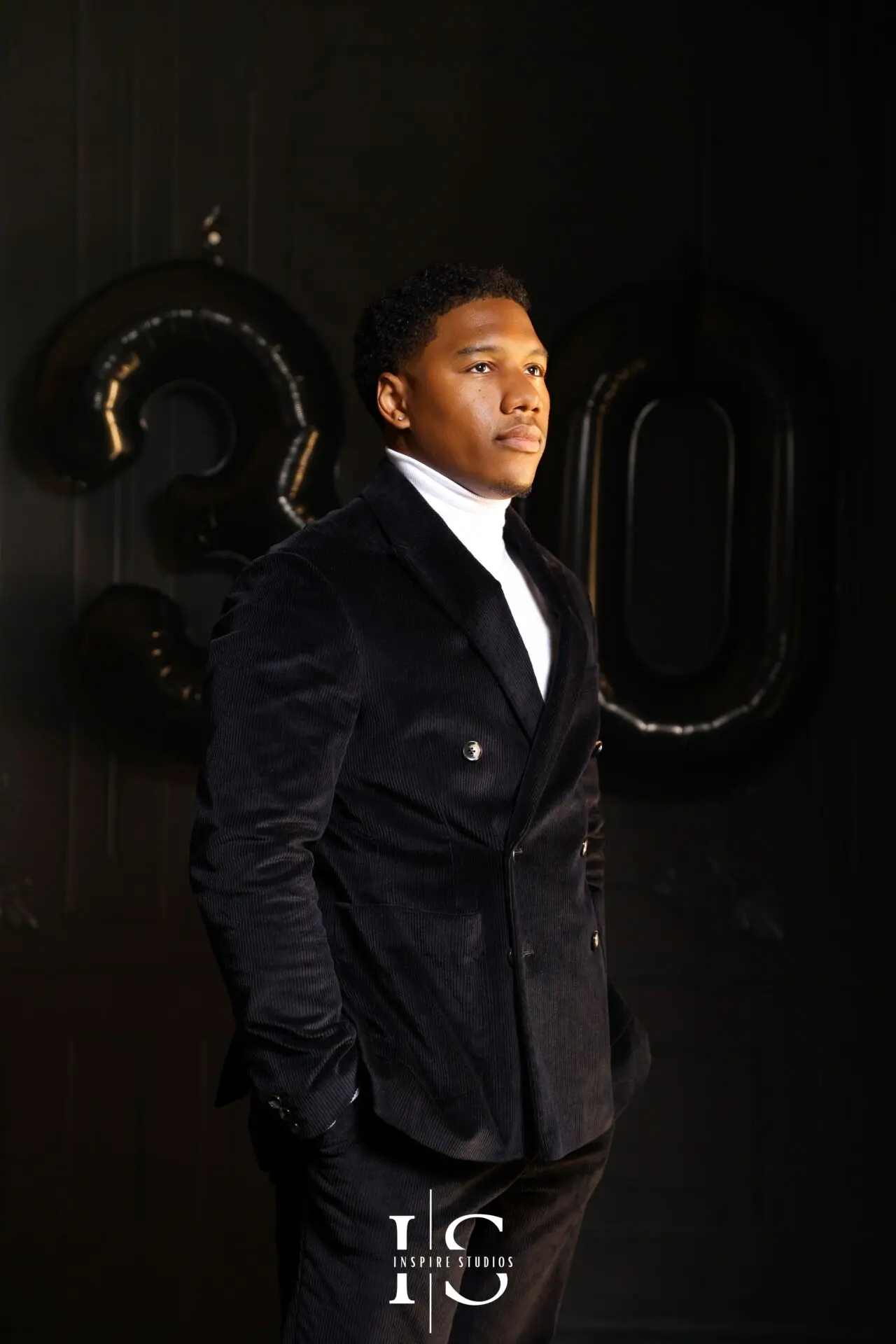 Mens 30th birthday portrait photoshoot studio setup with formal outfit