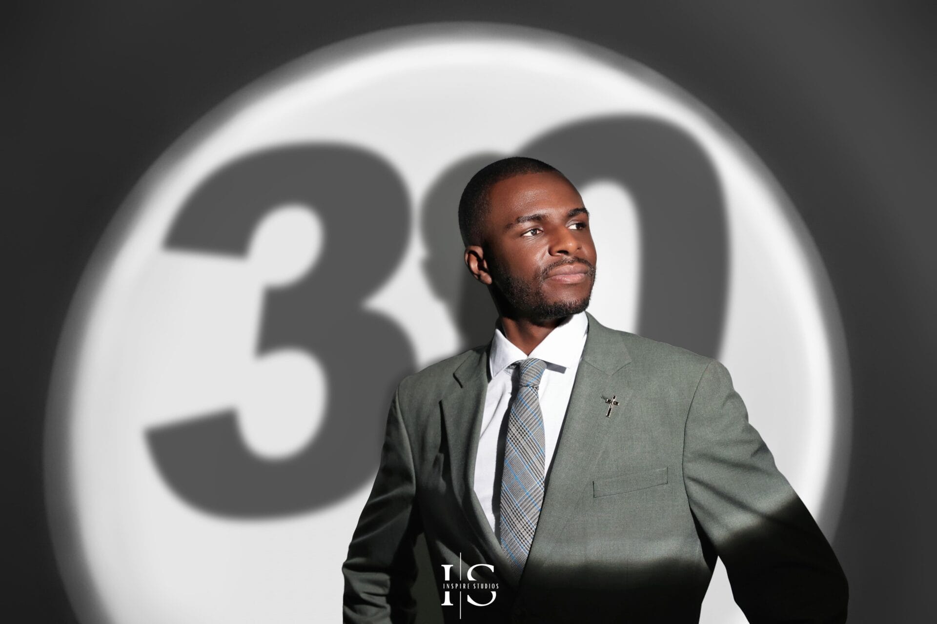 mens 30th birthday spotlight studio photoshoot dramatic lighting portrait
