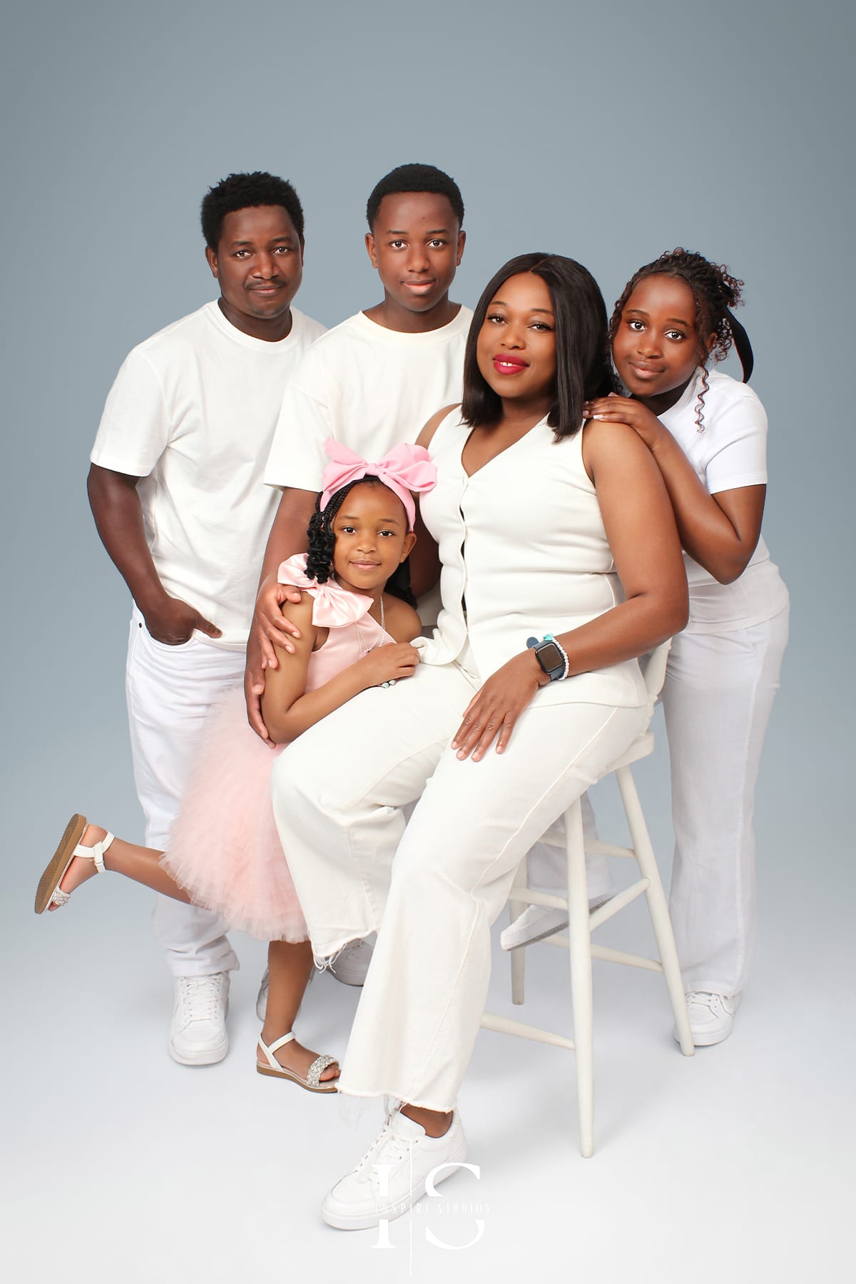 African family photoshoot captured at Inspire Studios featuring a beautifully styled family portrait in a professional photography studio.