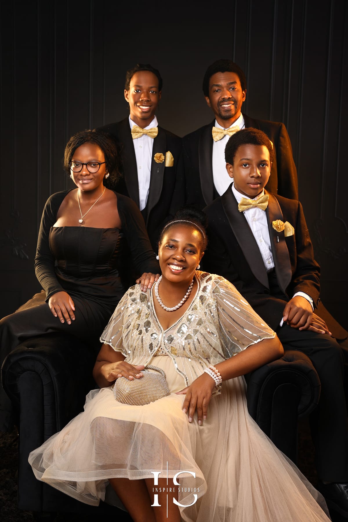 African milestone family photoshoot at Inspire Studios featuring a family celebrating culture, love, and special memories in a professional studio setting.