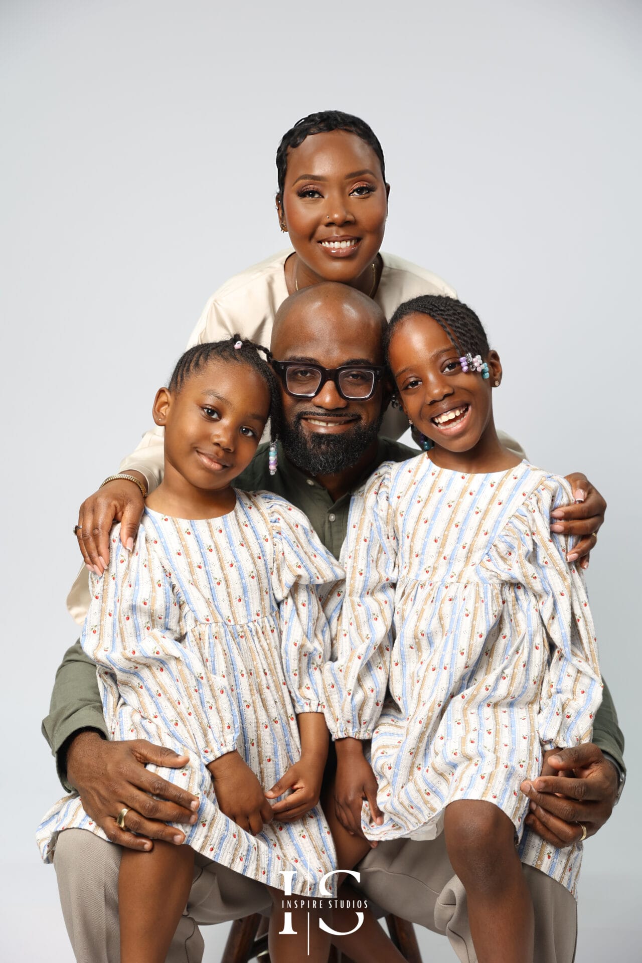 Anniversary family photoshoot in studio with parents and children