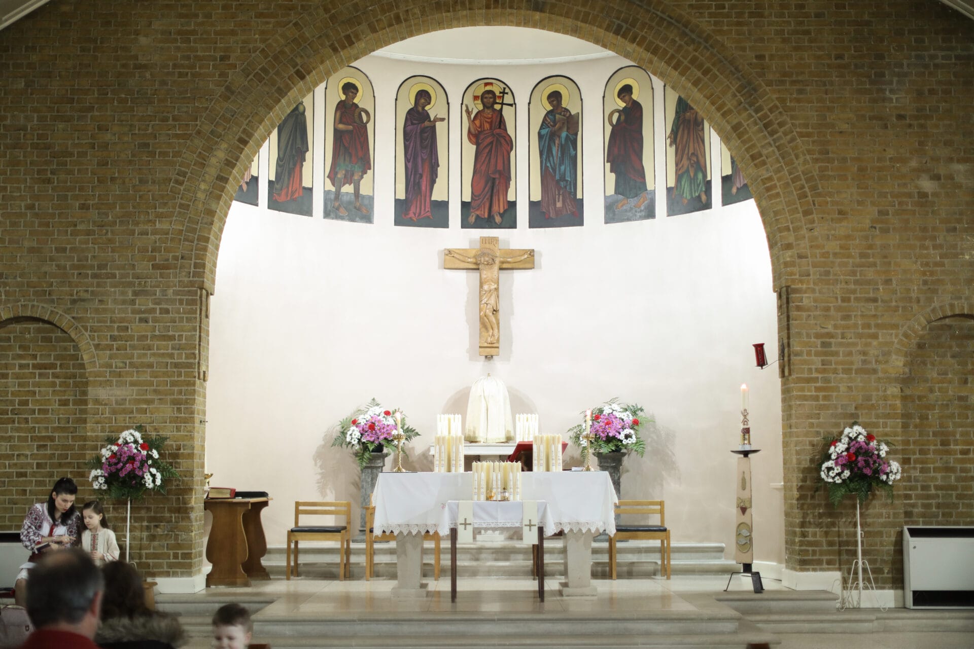 Christening photography at St Sebastian and Pancras Church in Kingsbury, London