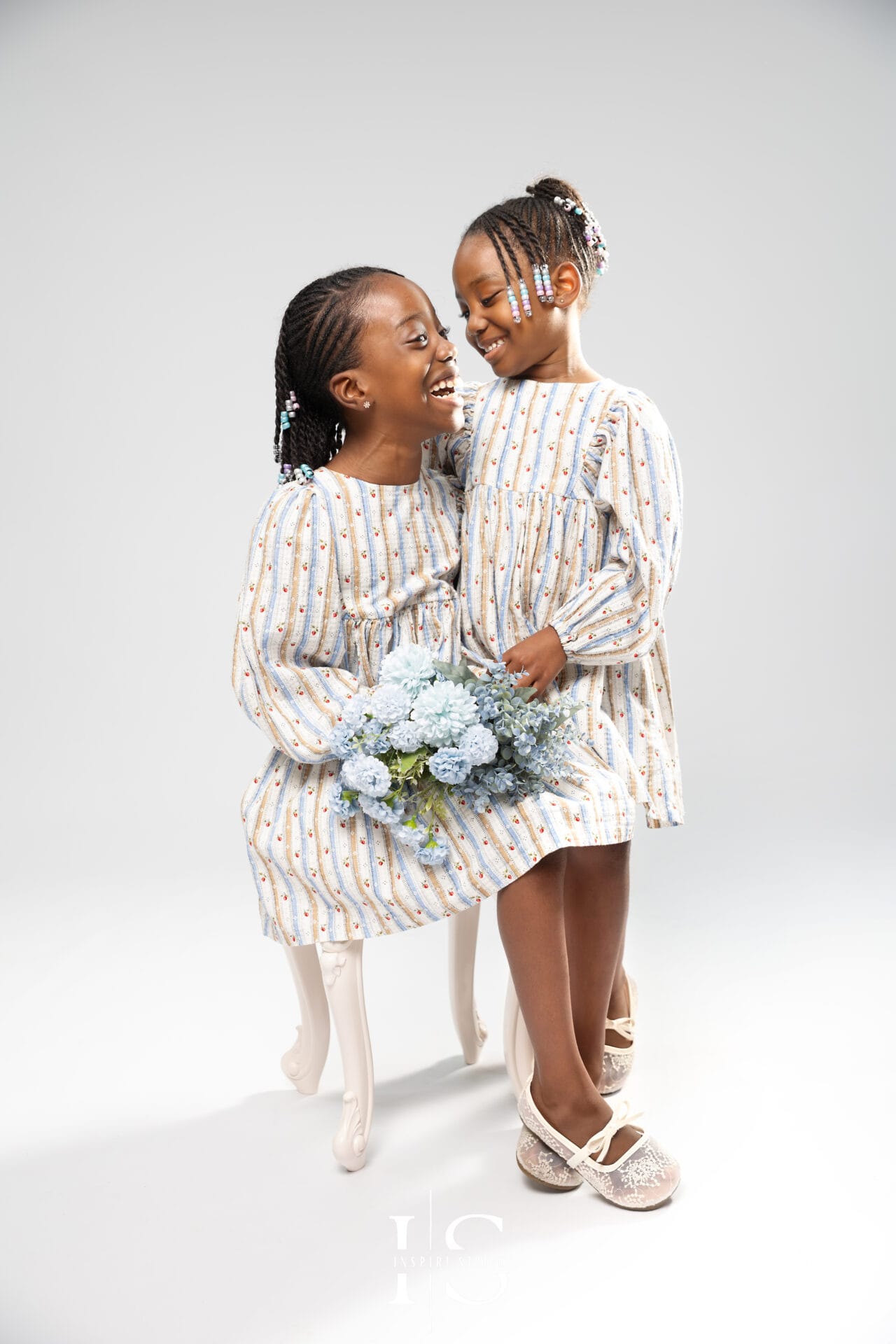 Couple and family anniversary portraits in a professional photography studio
