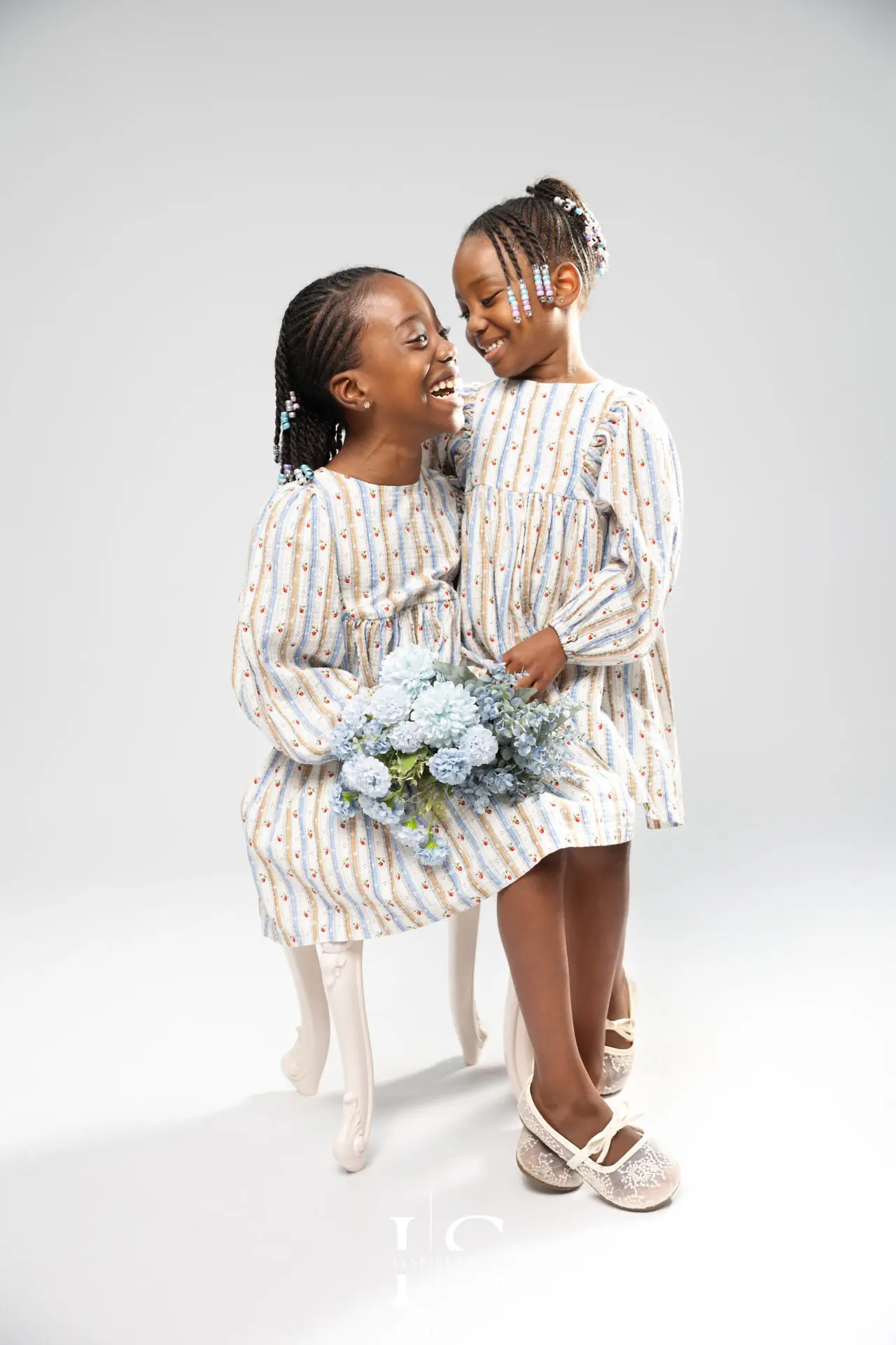 Couple and family anniversary portraits in a professional photography studio