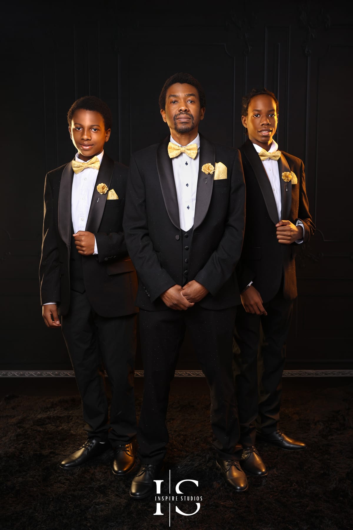Family photoshoot at Inspire Studios showing loved ones posing together for a professional studio portrait.