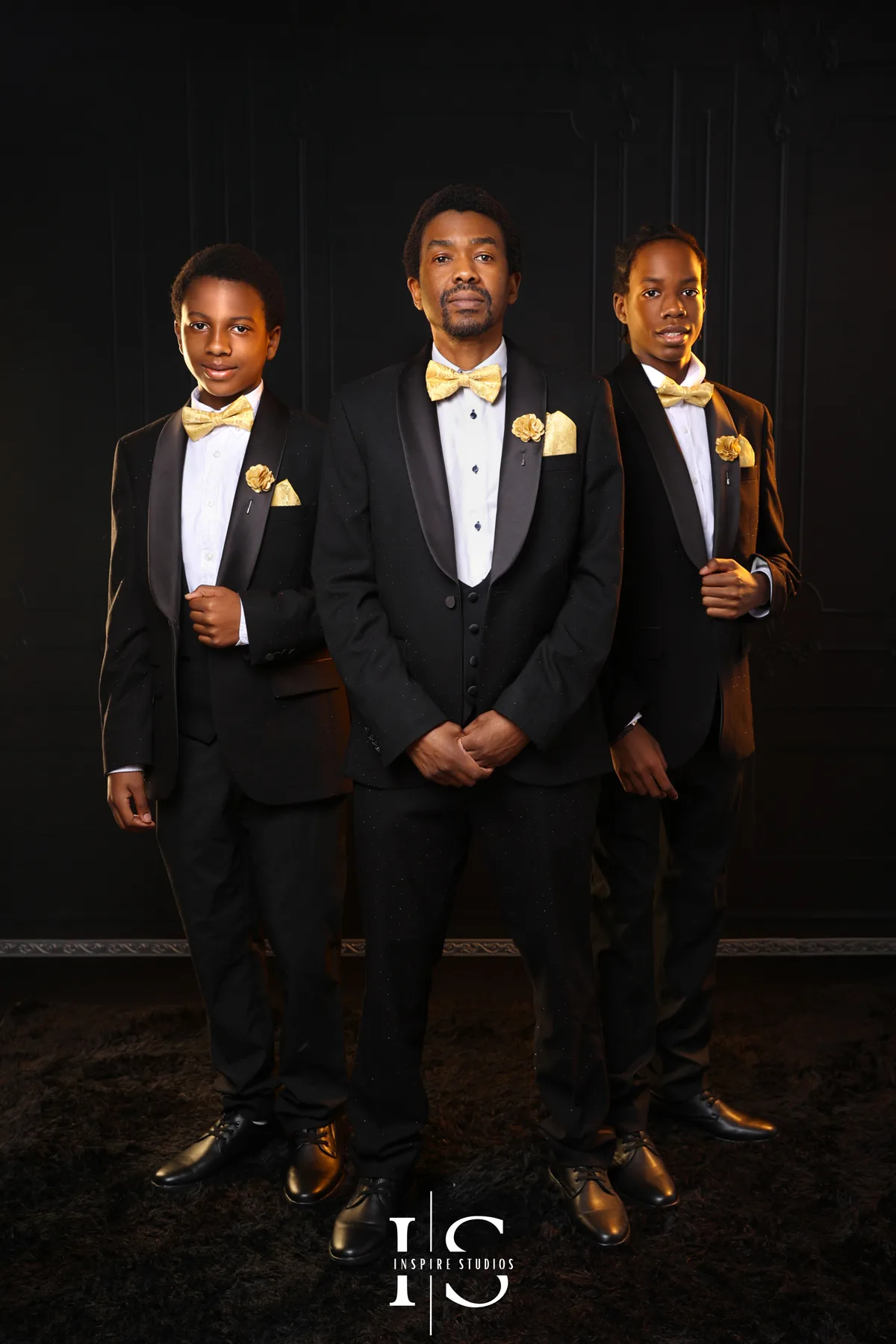Family photoshoot at Inspire Studios showing loved ones posing together for a professional studio portrait.
