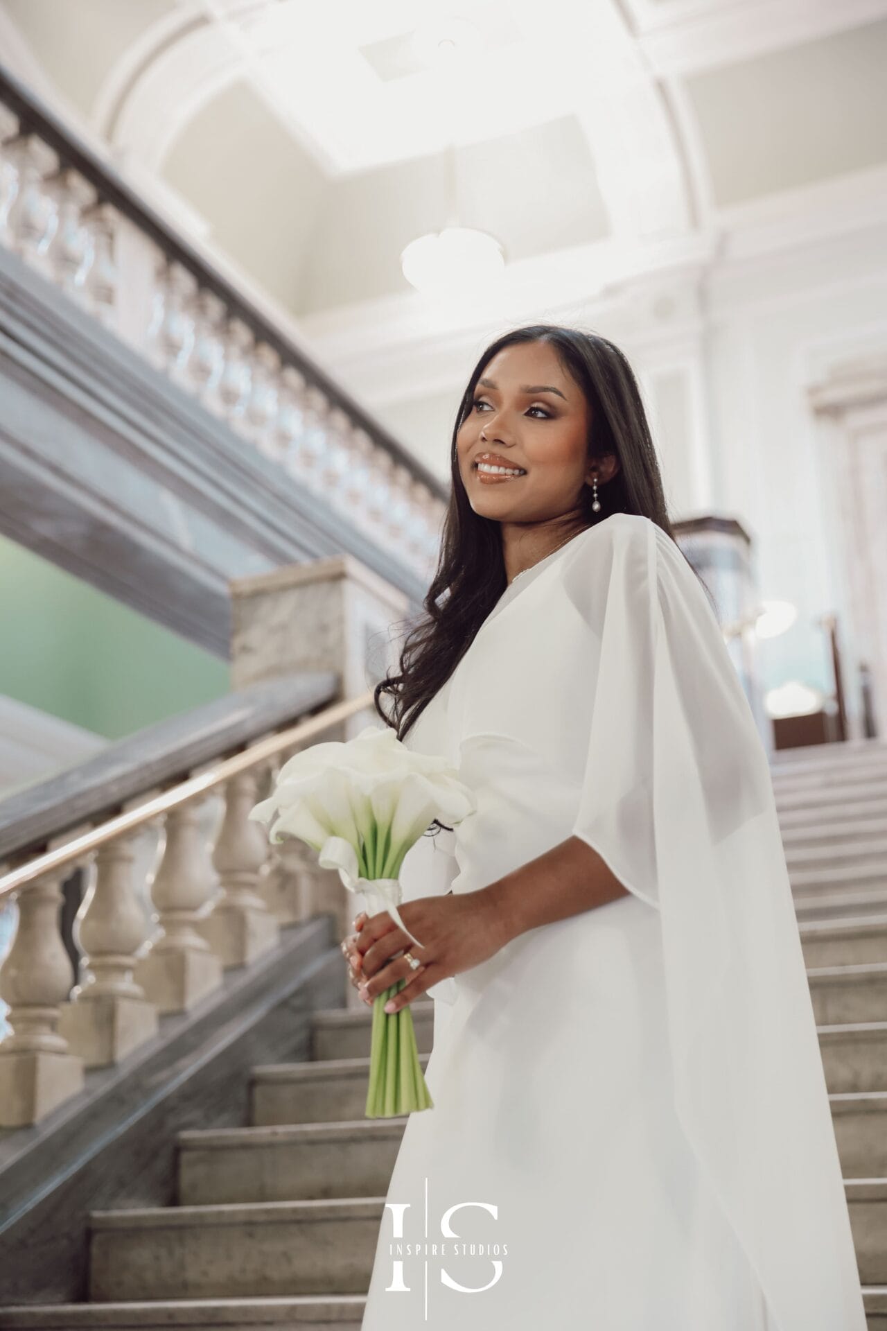 Ceremony at Islington Town Hall London captured by female wedding photographer