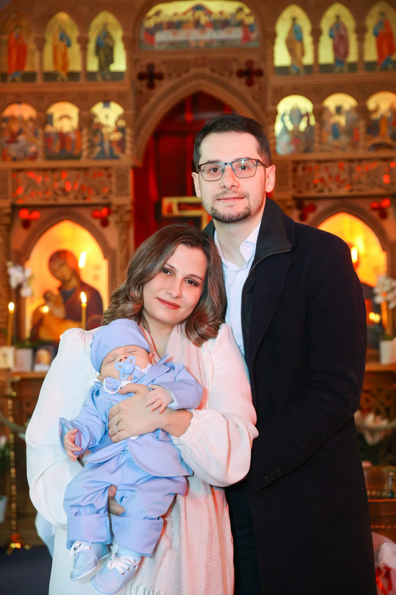 Female christening photographer from Inspire Studios at Parohia Sf Ilie London