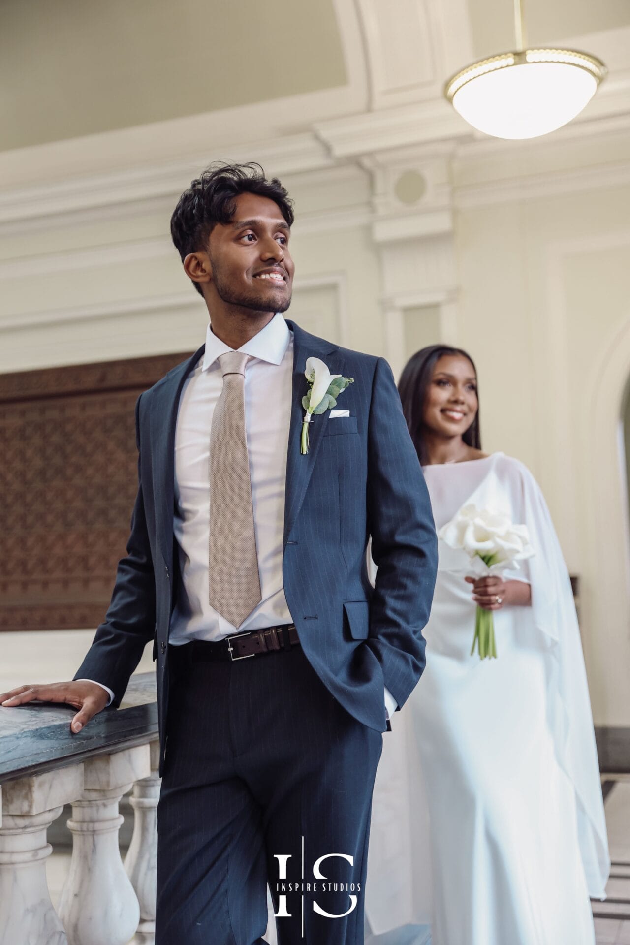 Couple shot by female wedding photographer at Islington Town Hall London