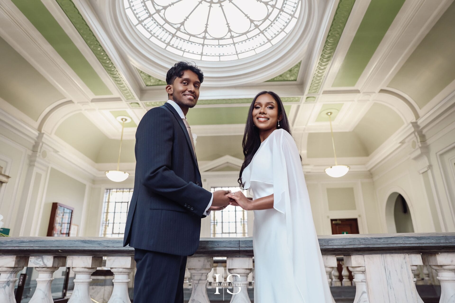Bride and groom portrait at Islington Town Hall London smiling together