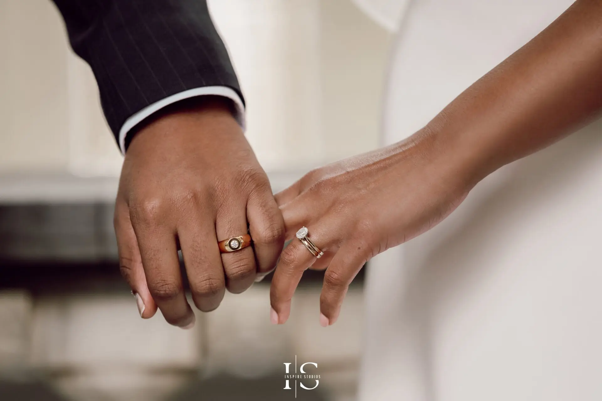 Wedding detail photography showing rings, flowers and wedding decorations