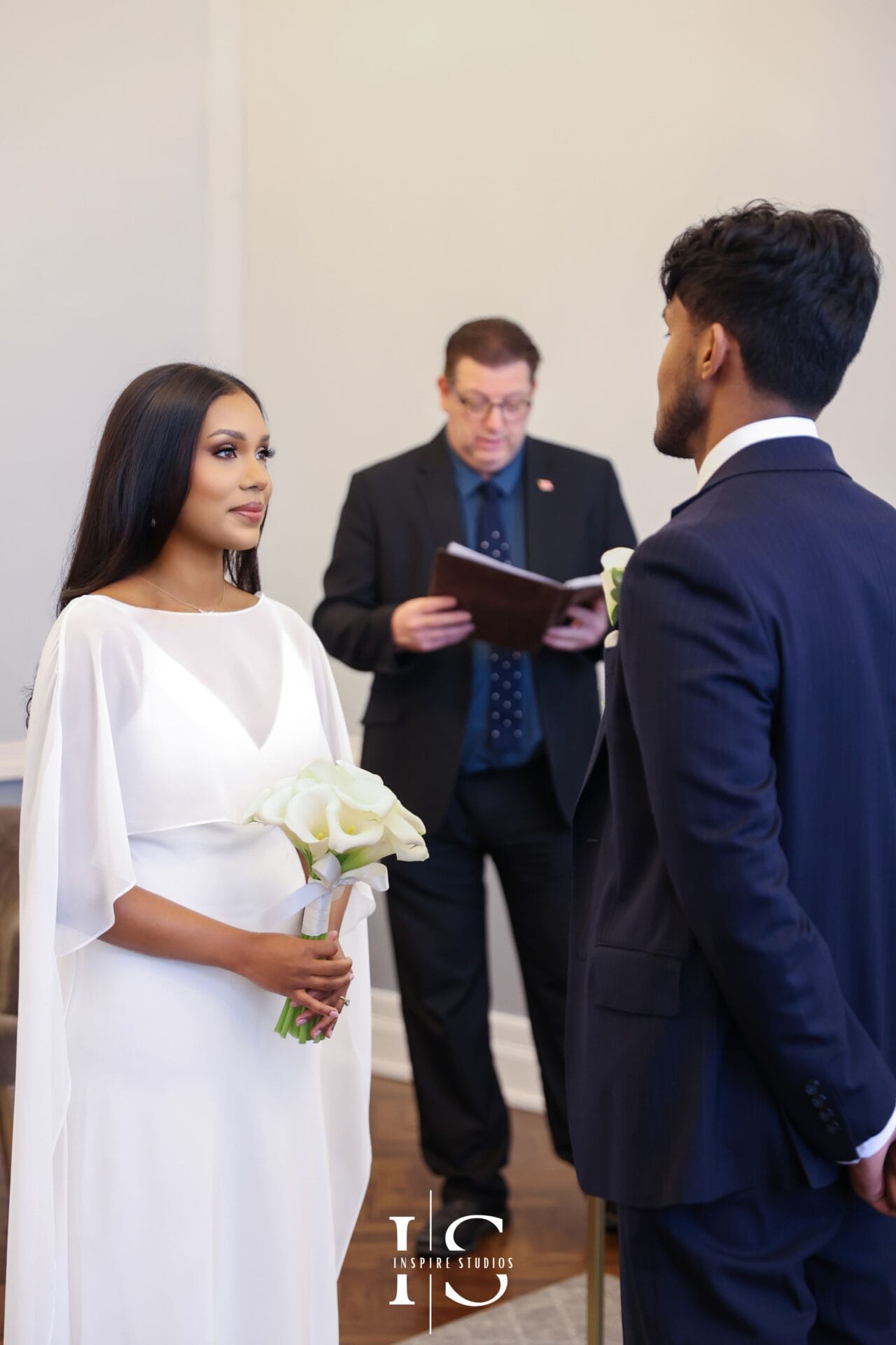 Registry wedding day at Islington Town Hall London with couple celebrating