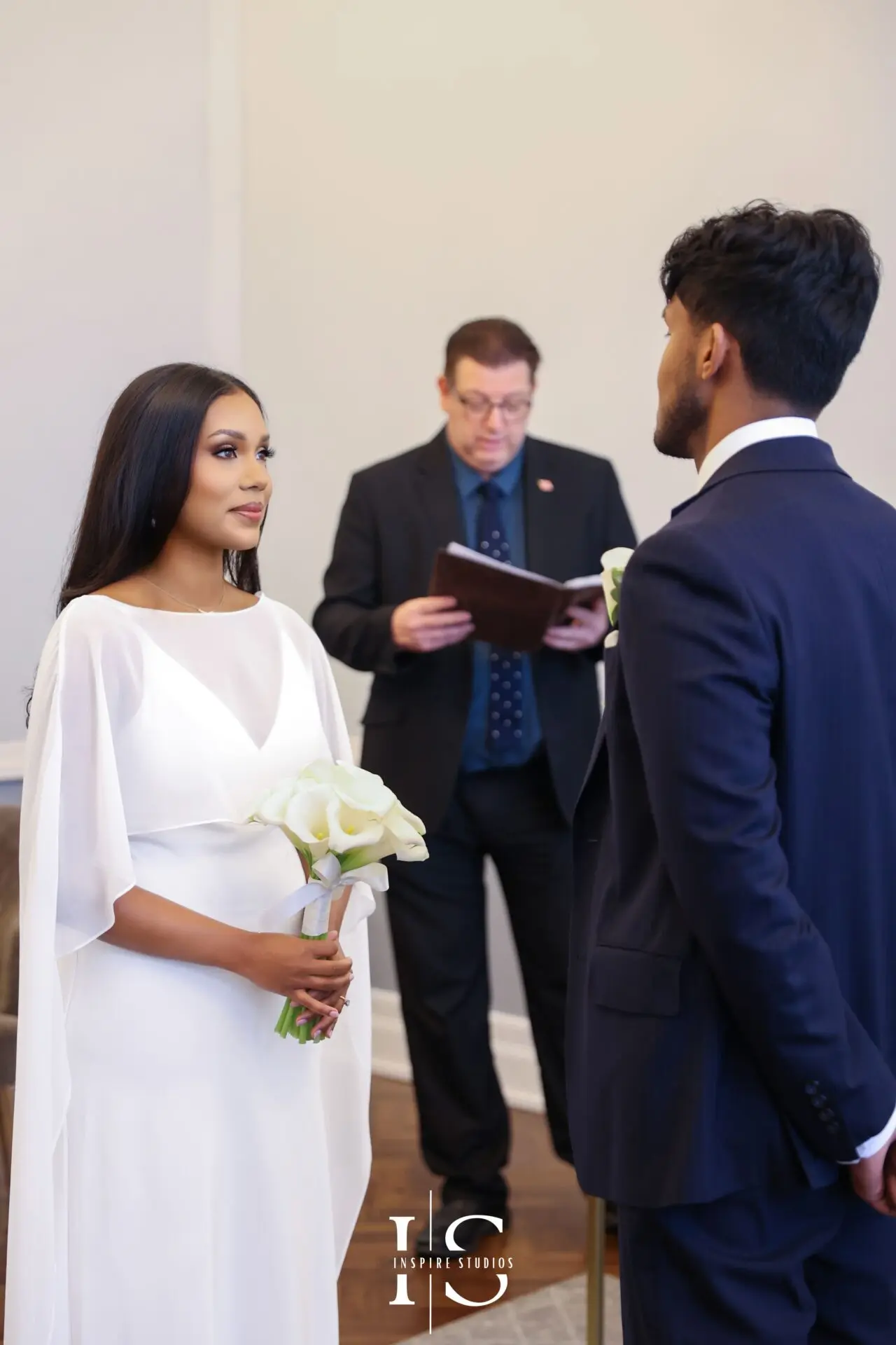 Registry wedding day at Islington Town Hall London with couple celebrating