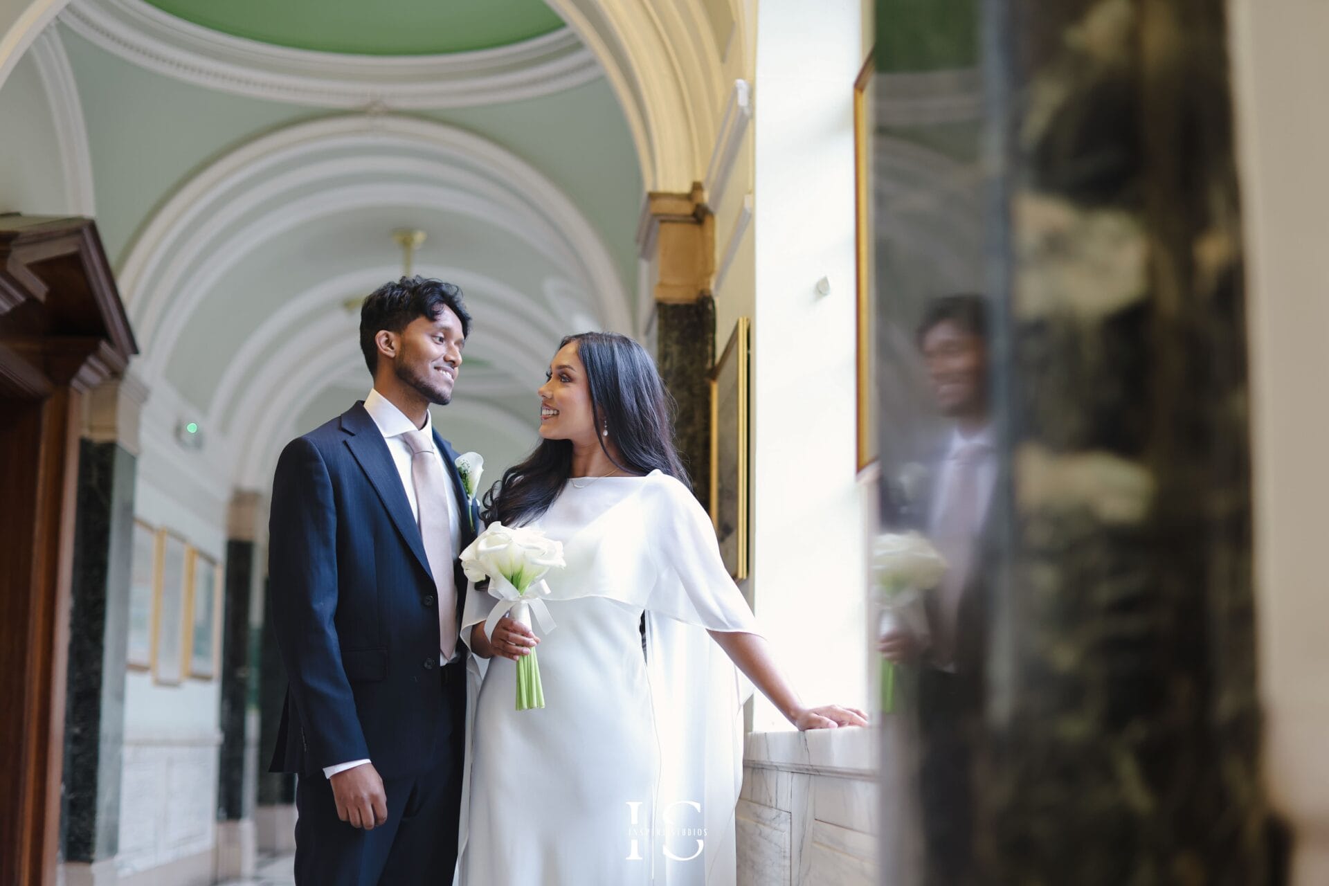 Couple portrait at registry wedding in Islington Town Hall London with natural romantic light