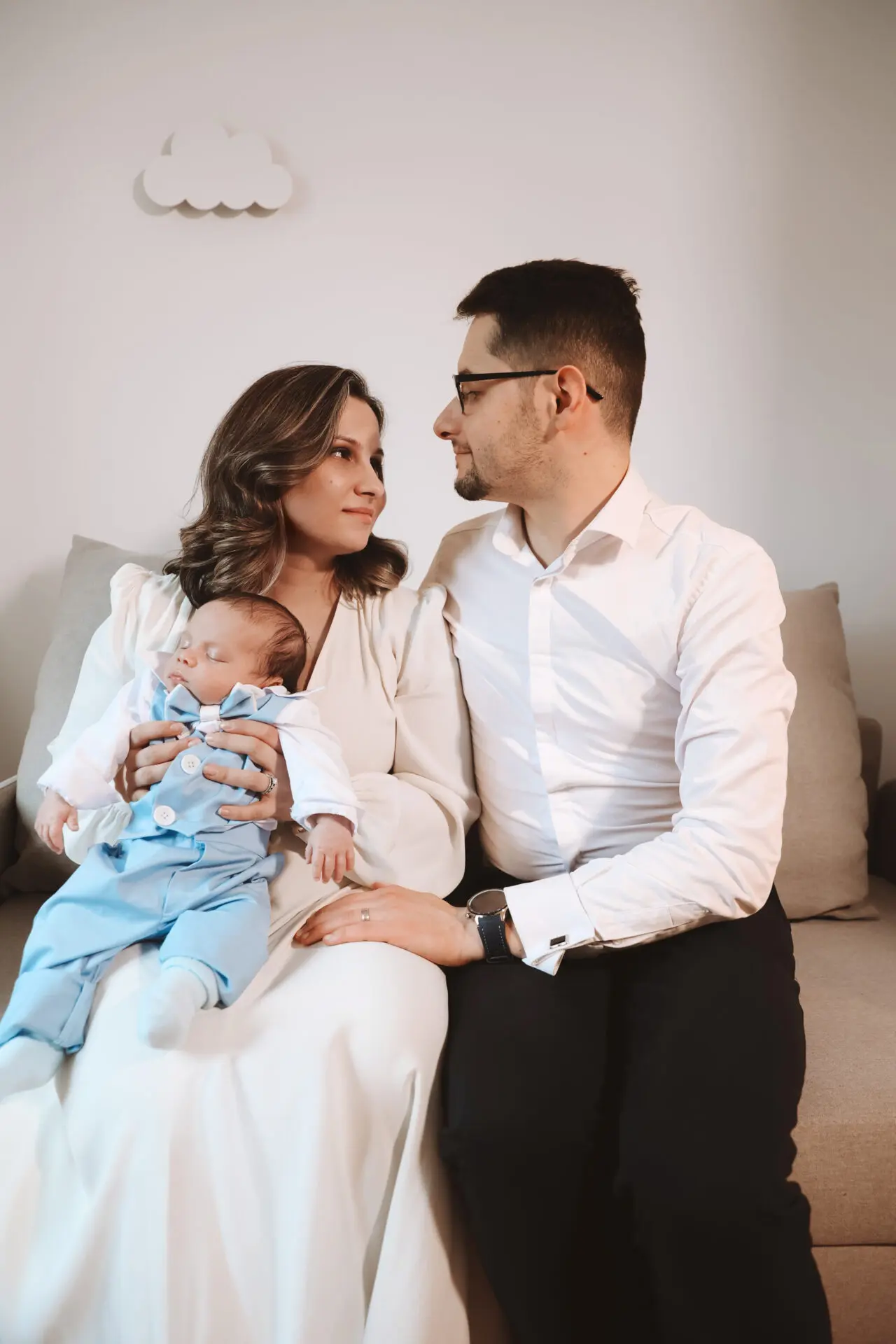 Romanian female photographer capturing an Orthodox christening ceremony in a London church