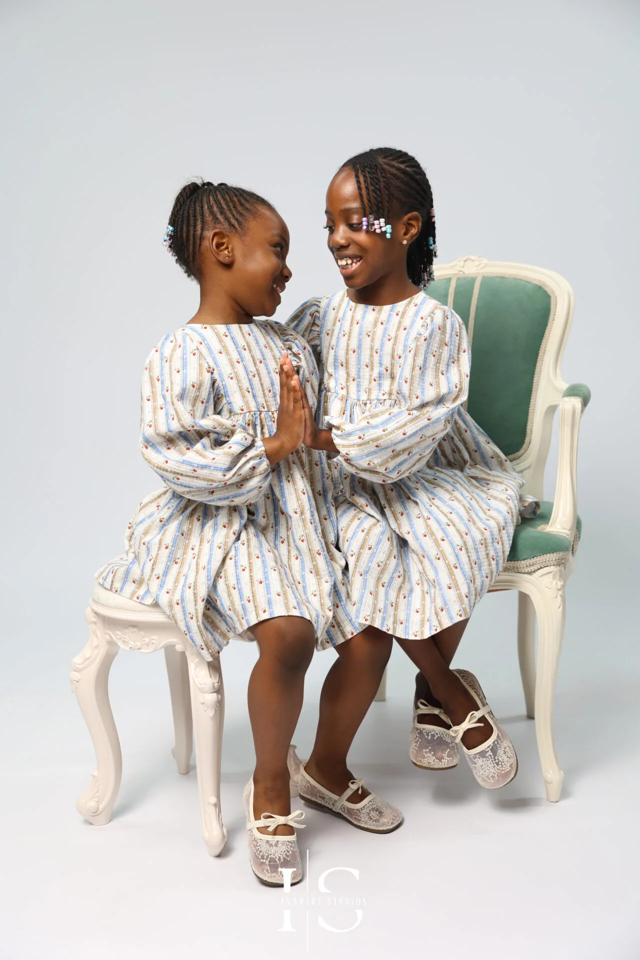 Family celebrating a special anniversary during a studio family photoshoot