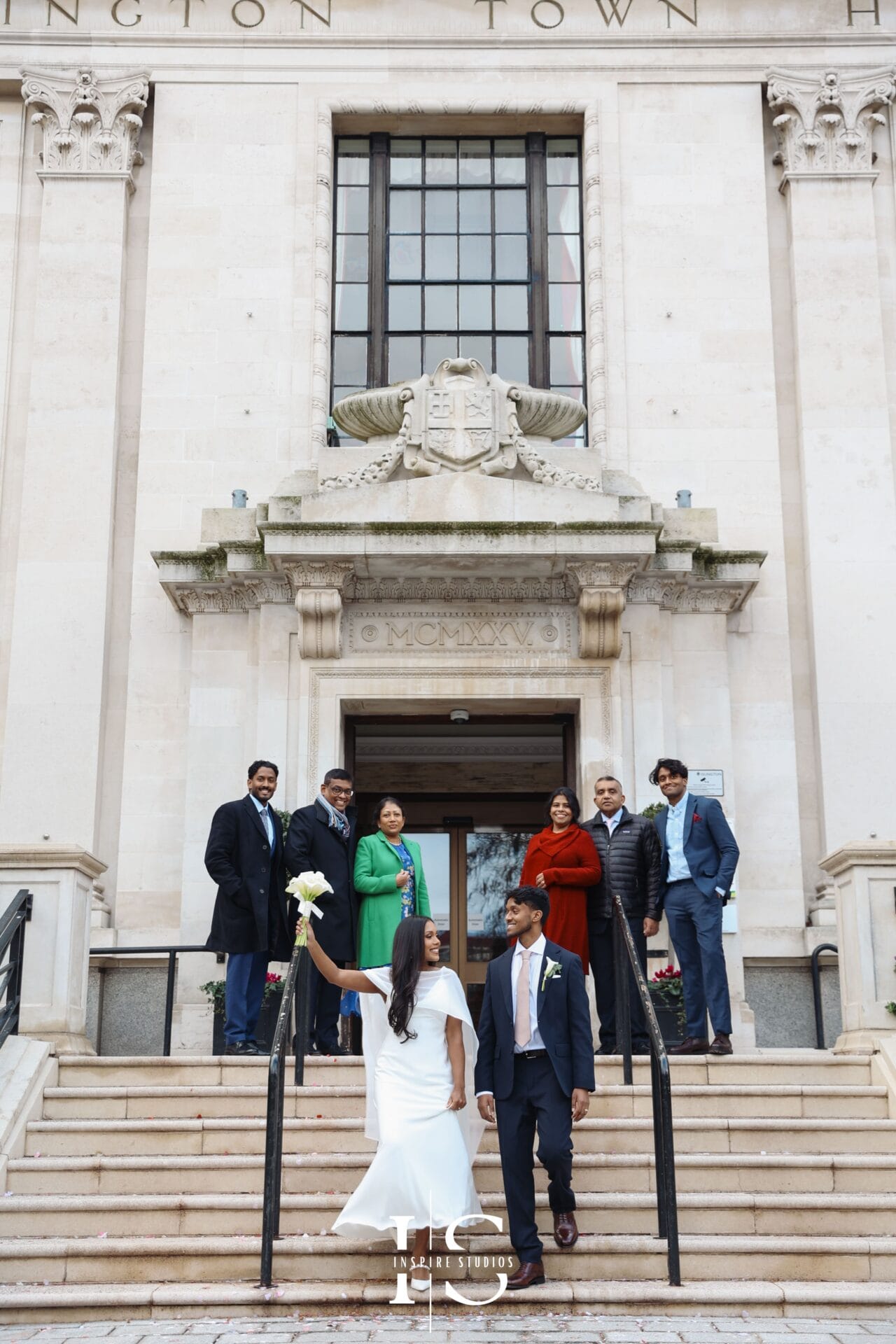 Wedding ceremony at Islington Town Hall London with guests and couple