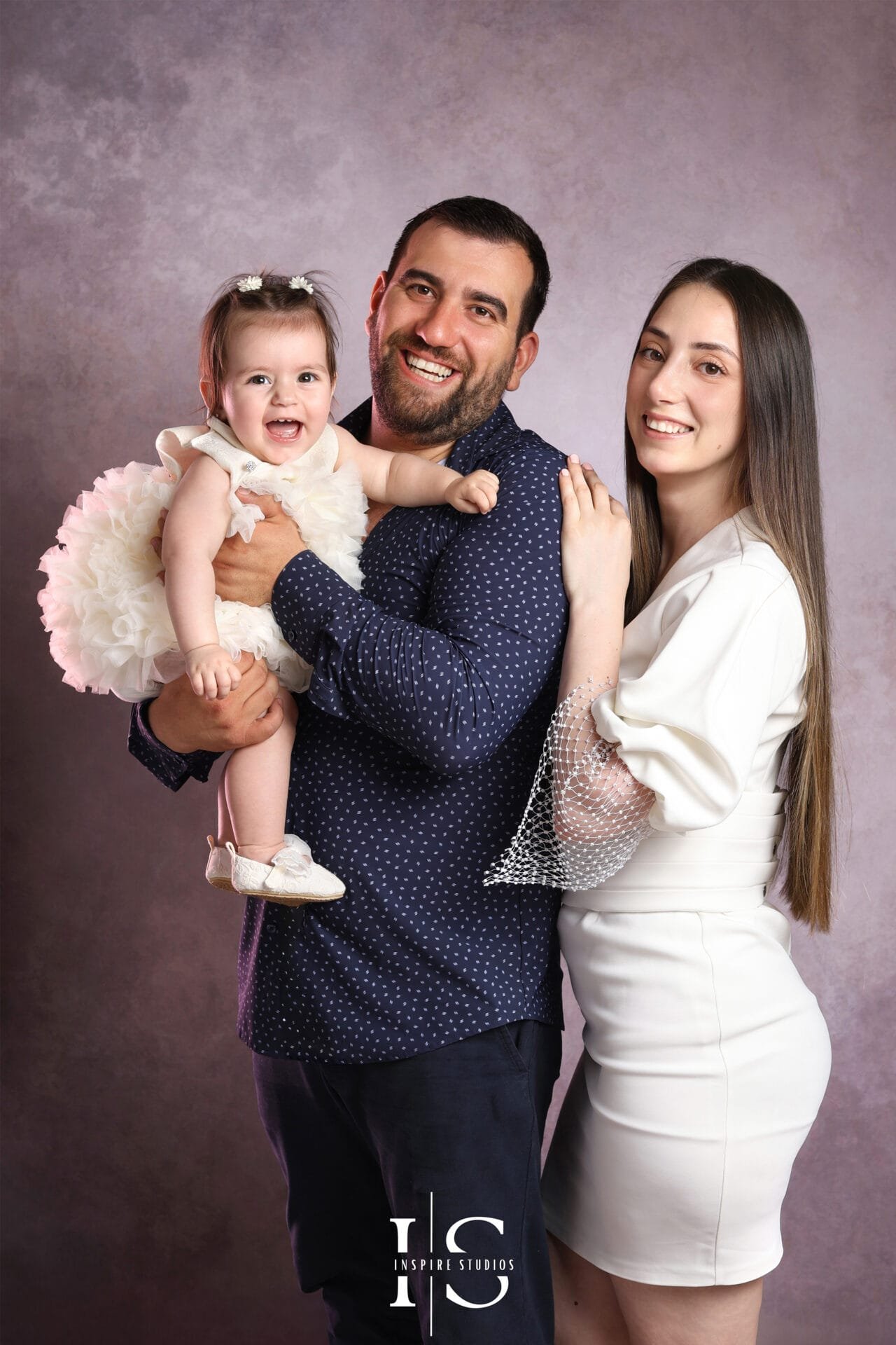 Albanian studio family photoshoot at Inspire Studios London, capturing elegant family portraits with professional lighting.