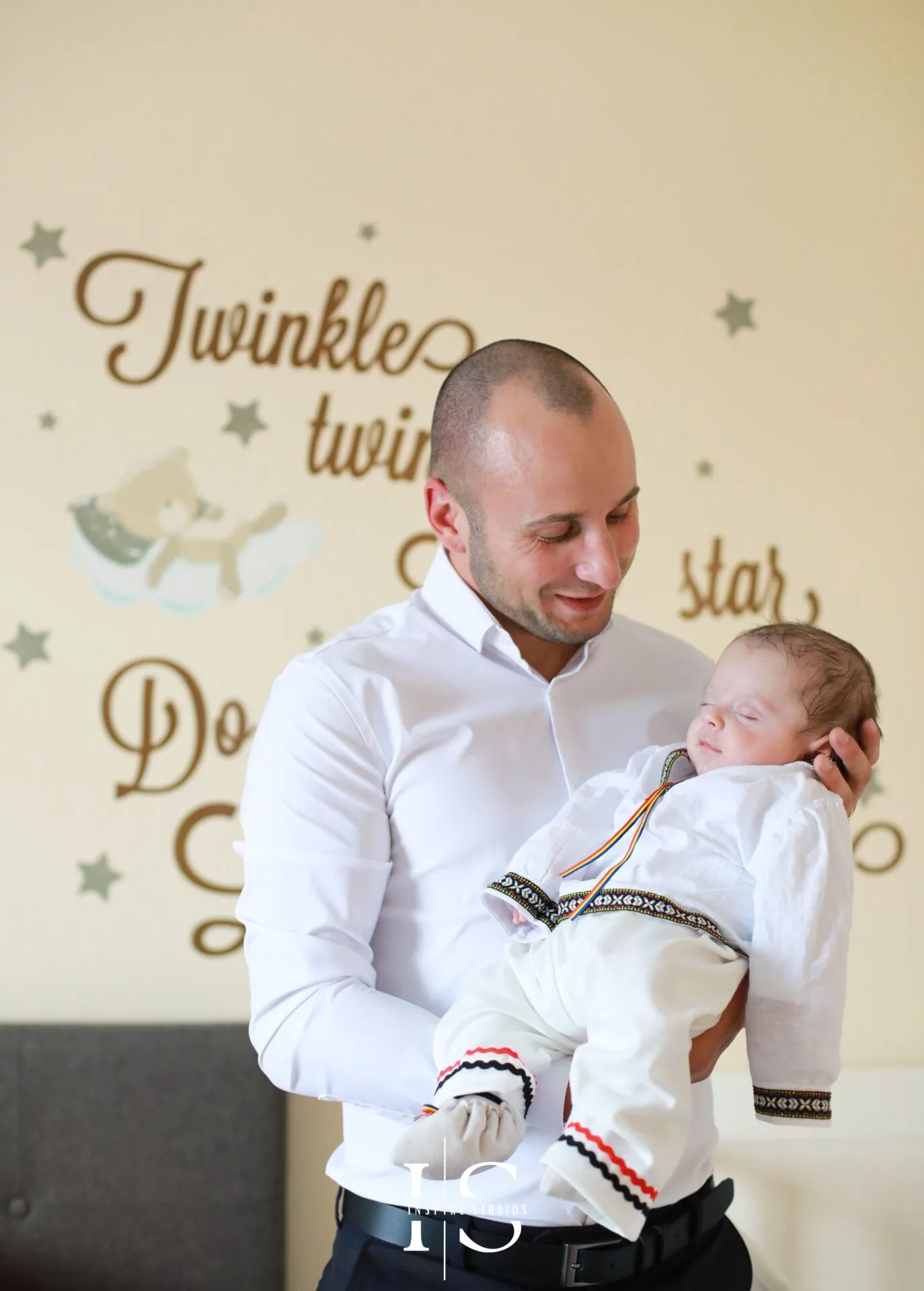 Christening day home photography in London with baby, parents and family before church.