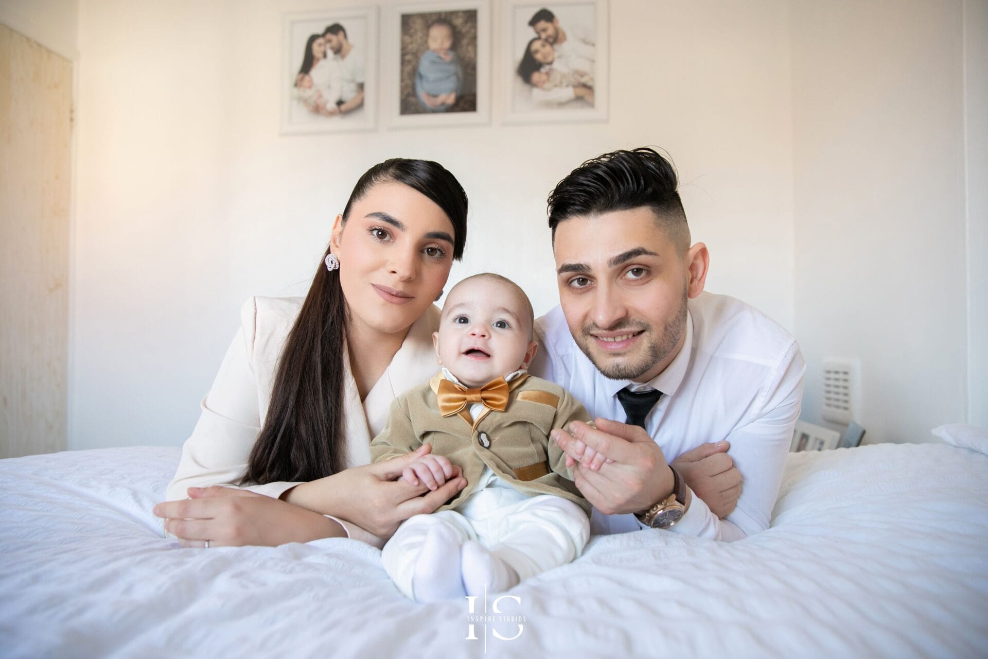 Family christening morning at home in London with baby, parents and natural preparation moments.