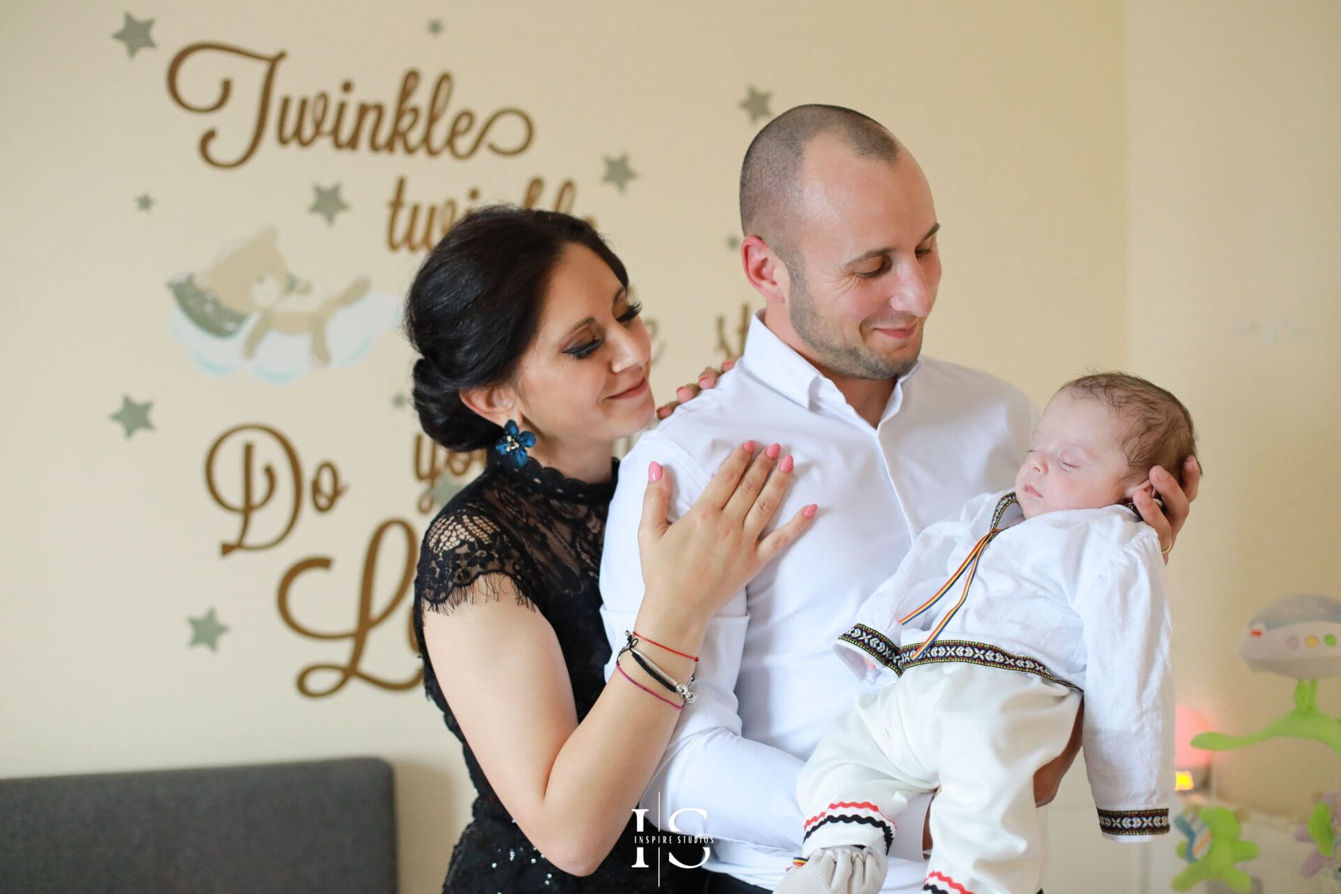 London christening home shots with baby, parents, outfit details and family moments before church.
