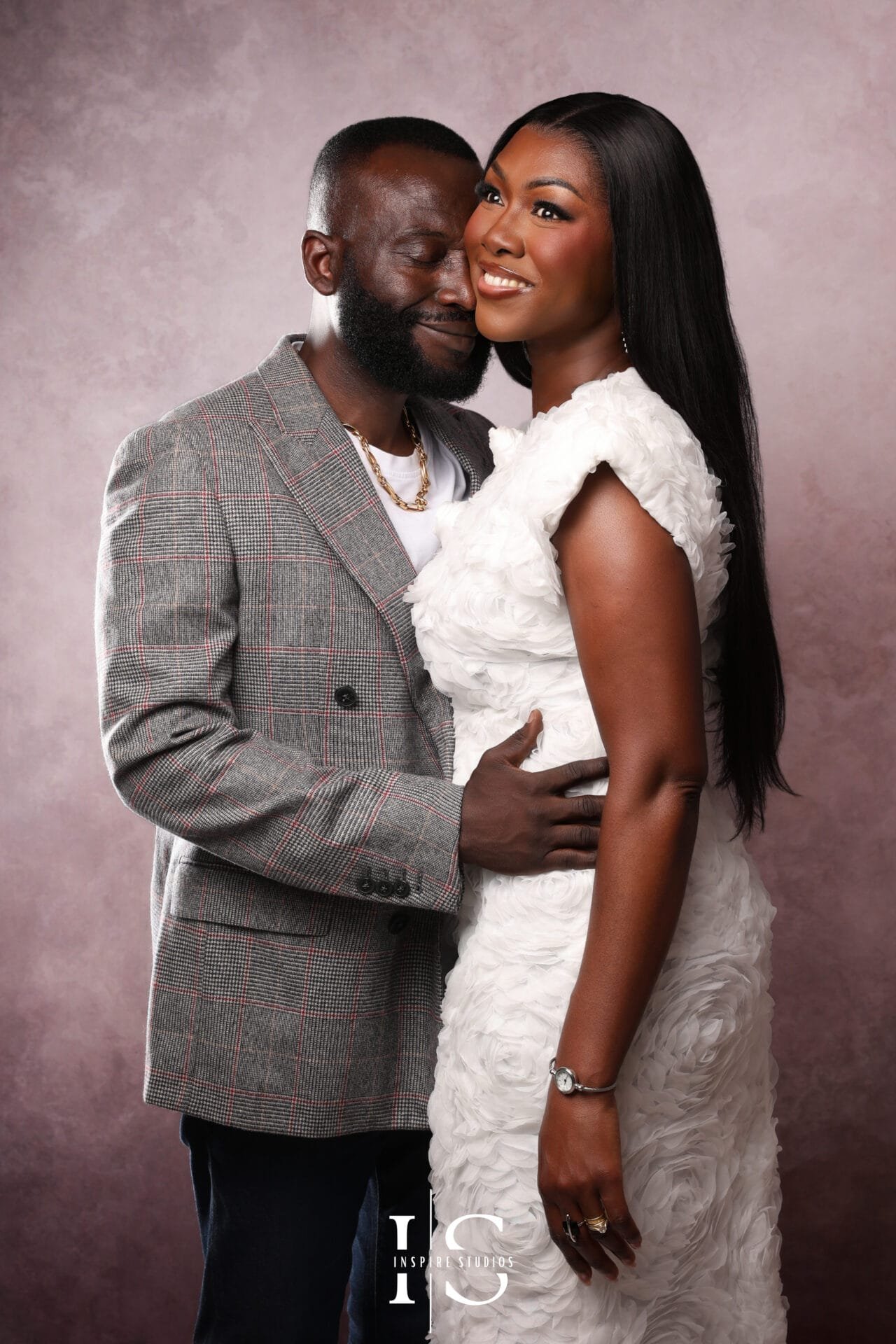 Family celebrating a special milestone during a studio photoshoot at Inspire Studios in London