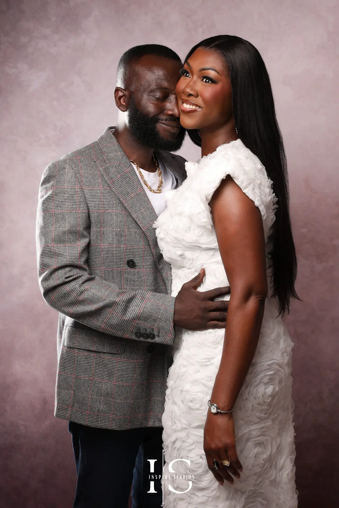Family celebrating a special milestone during a studio photoshoot at Inspire Studios in London