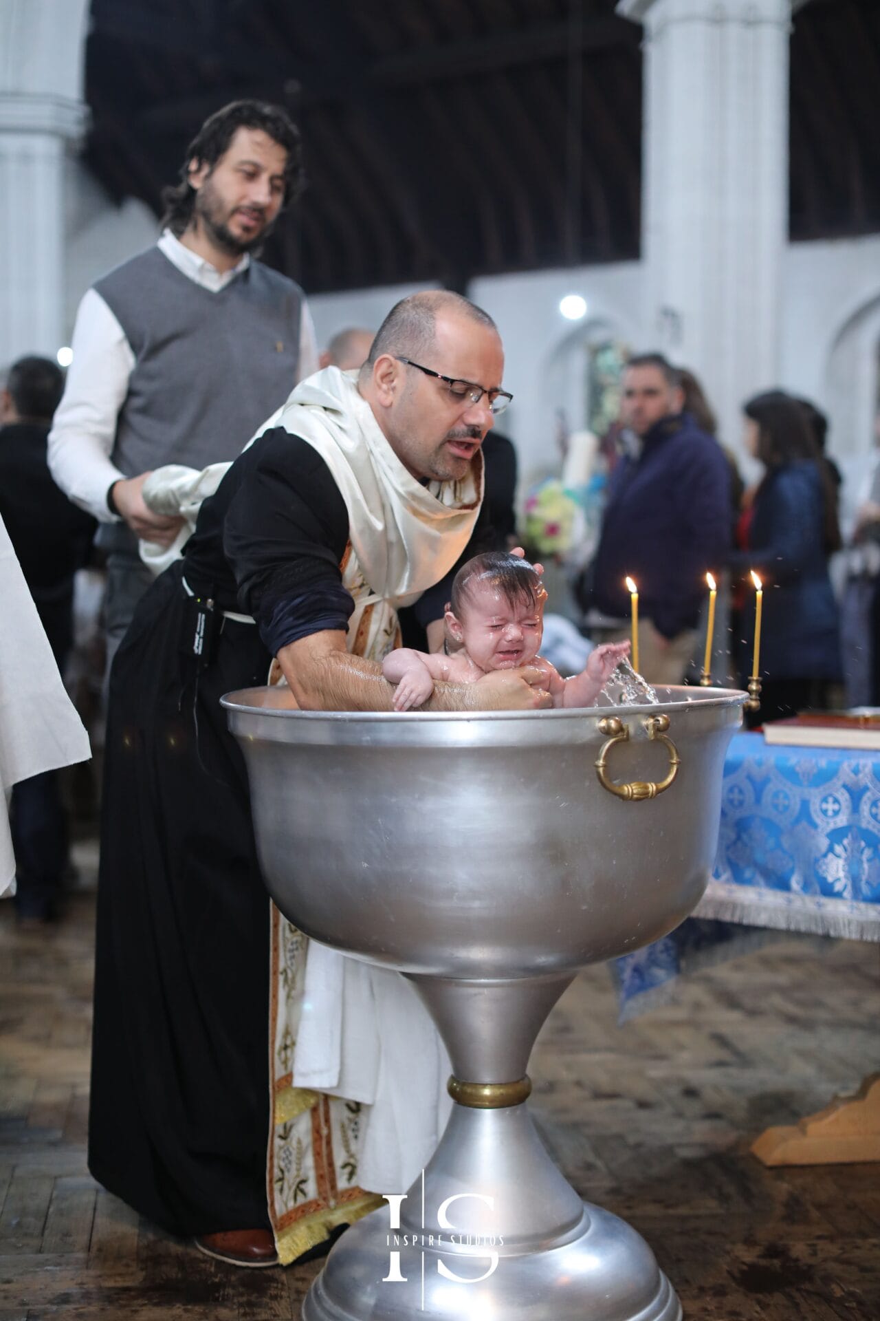 Christening photographer at St Margaret and St Columba Church in London, capturing baby, parents and family moments.