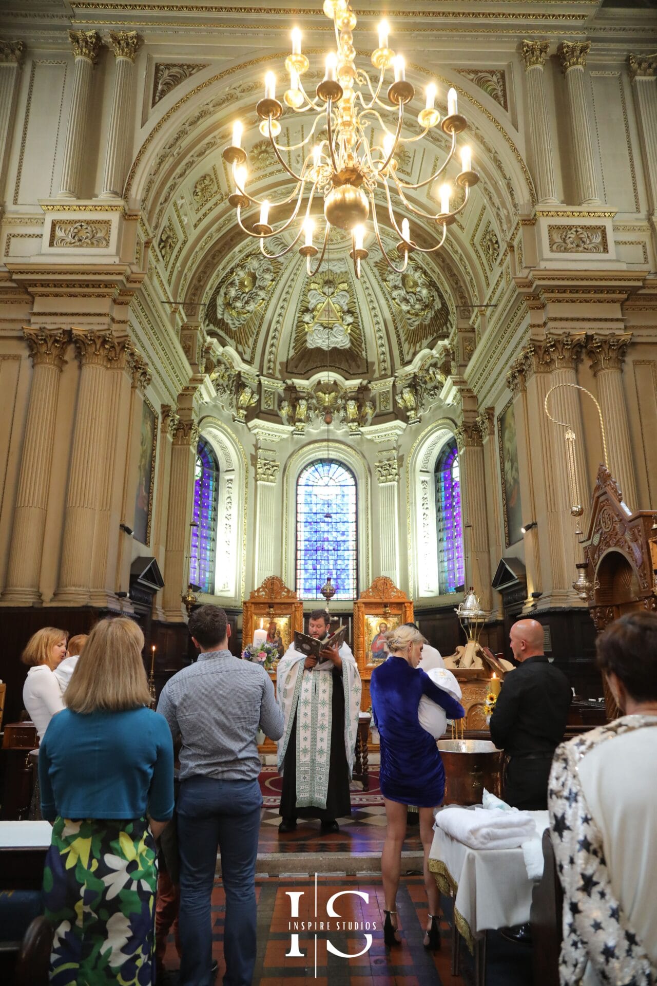 Christening photographer at St Mary le Strand Church capturing natural family and ceremony moments.