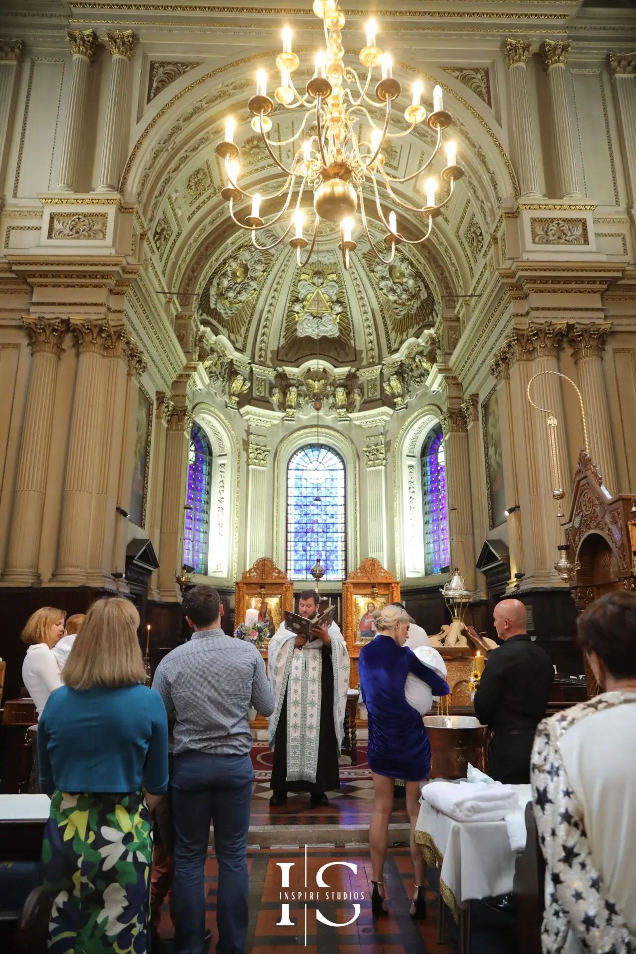 Christening photographer at St Mary le Strand Church capturing natural family and ceremony moments.
