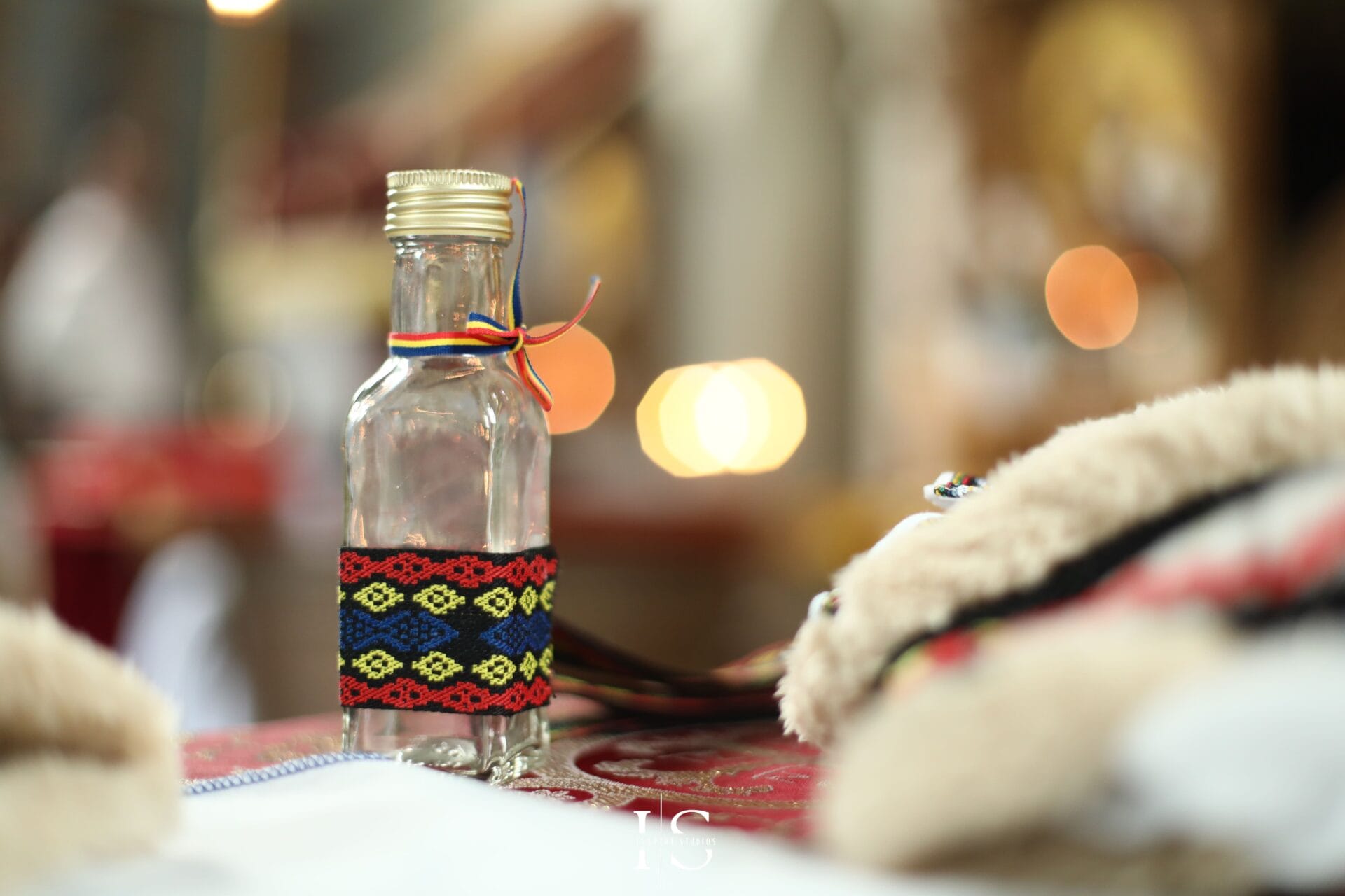 Romanian baptism photographer in London at St Mary le Strand Church with baby, parents and family.