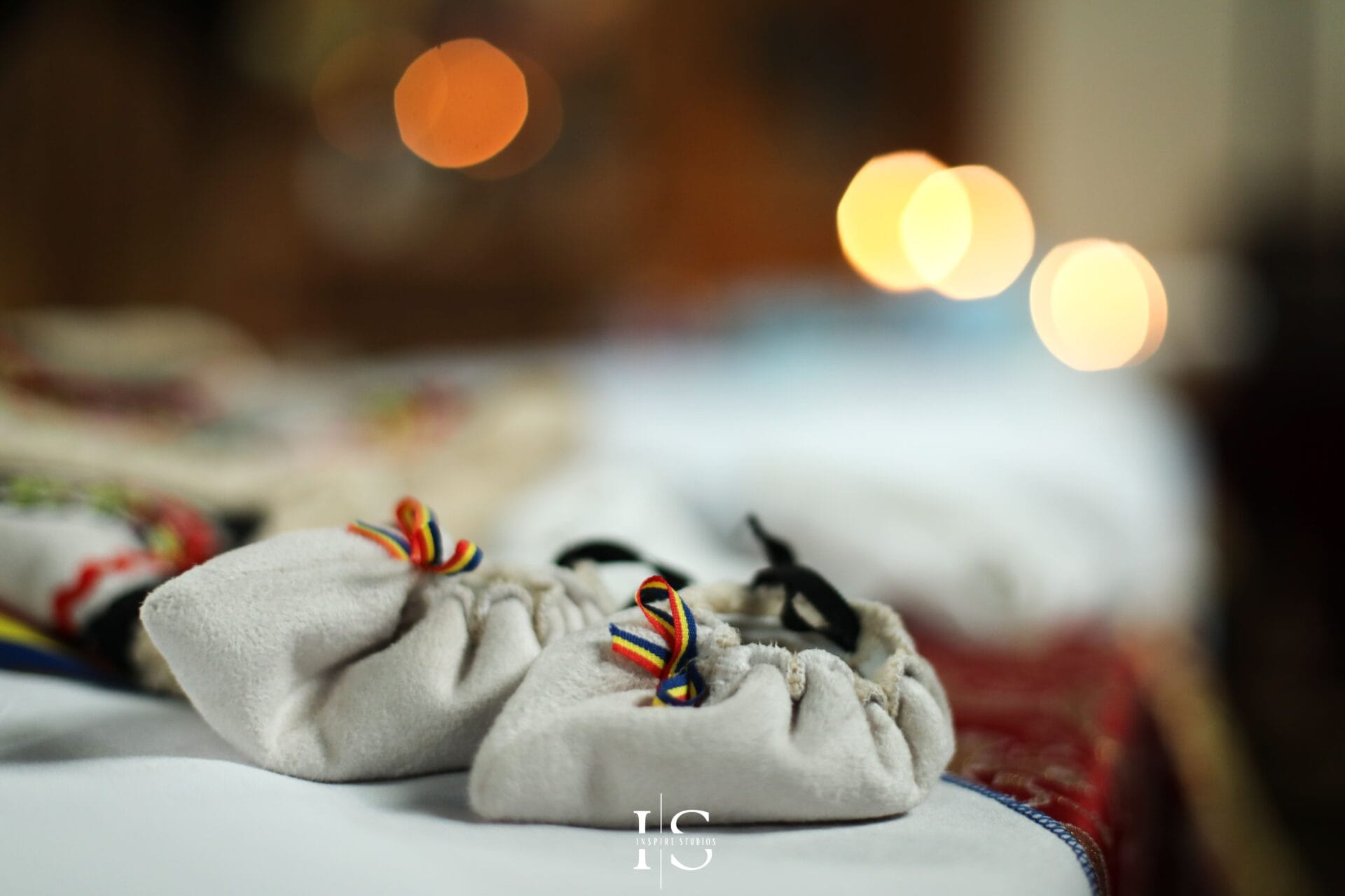 Romanian christening photographer in London at St Mary le Strand Church with baby and family.