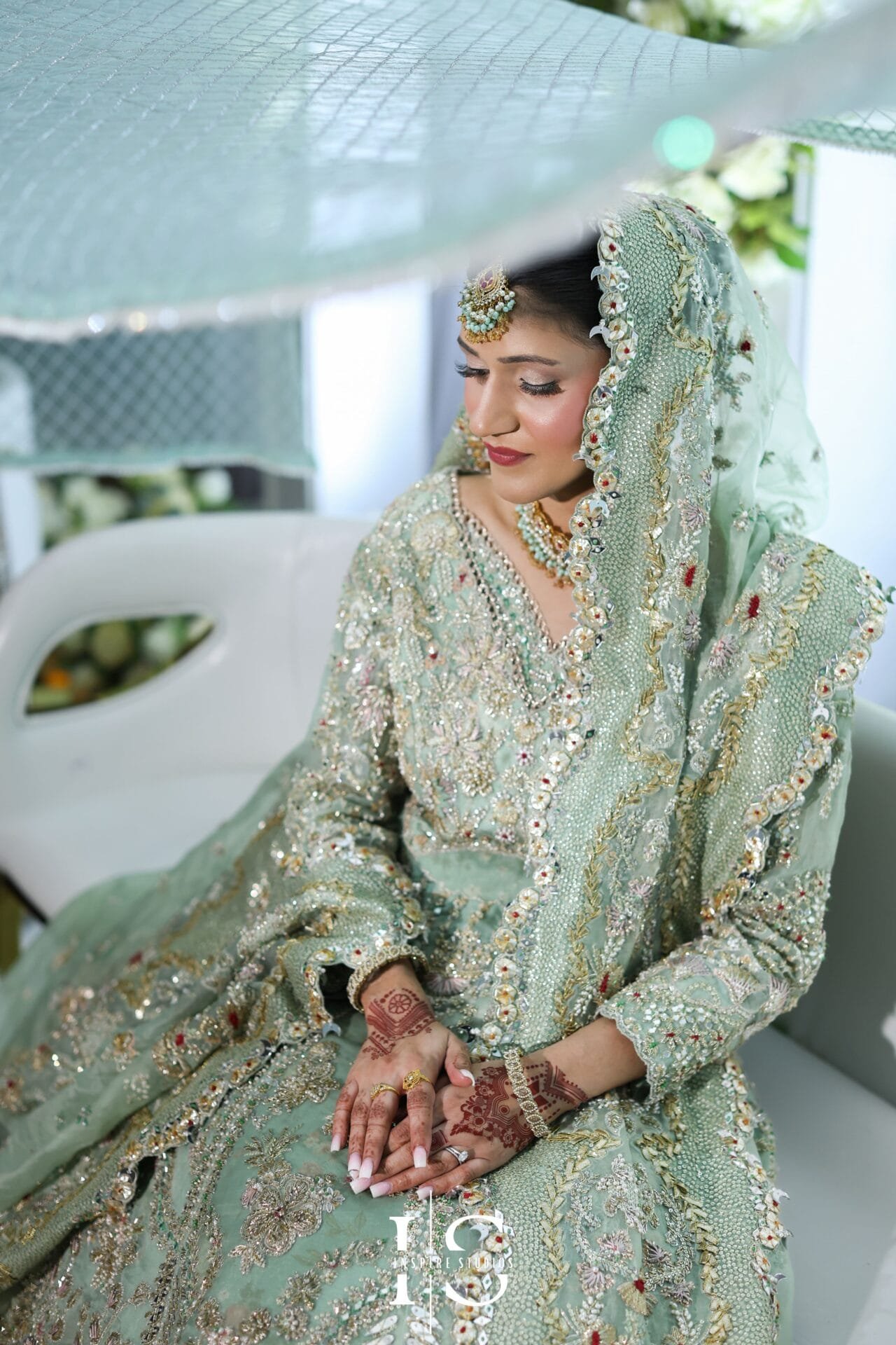 Bride posing for a bridal portrait at Hylands House wedding venue in Essex.
