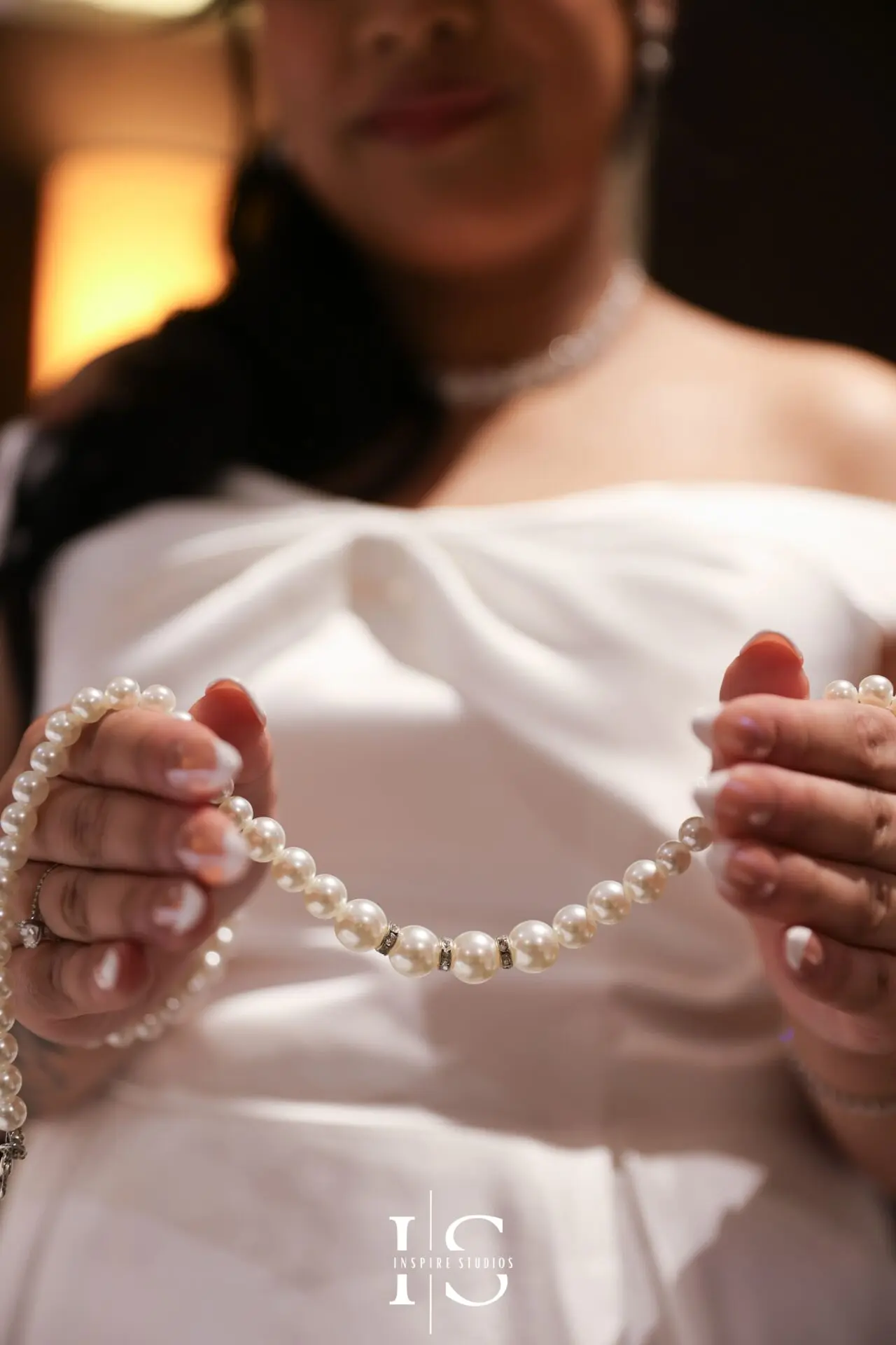 Filipino bride photographed during her bridal preparations at Danson House before the civil ceremony.
