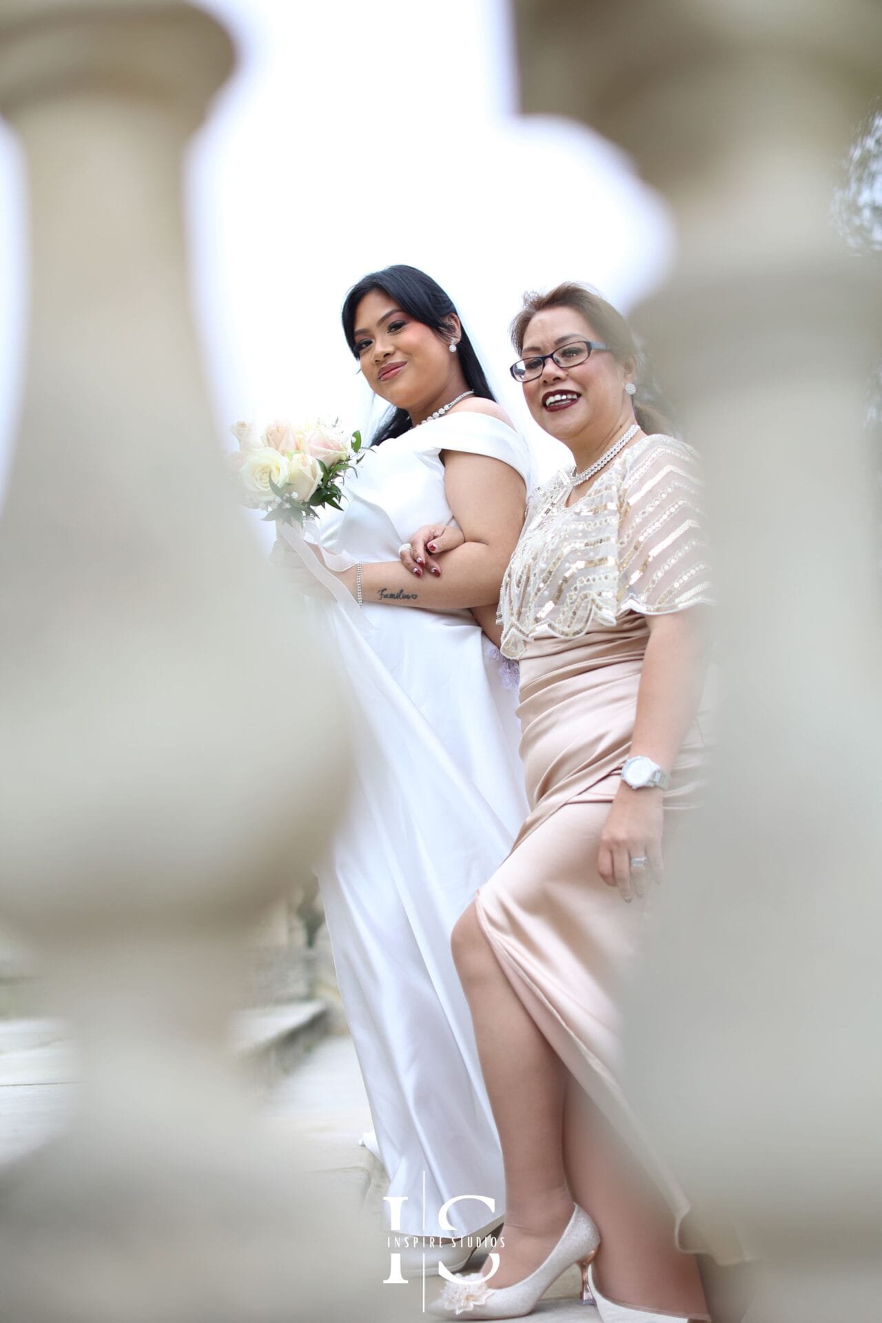 Filipino bride posing for natural wedding portraits photographed by a female photographer in Bexley.
