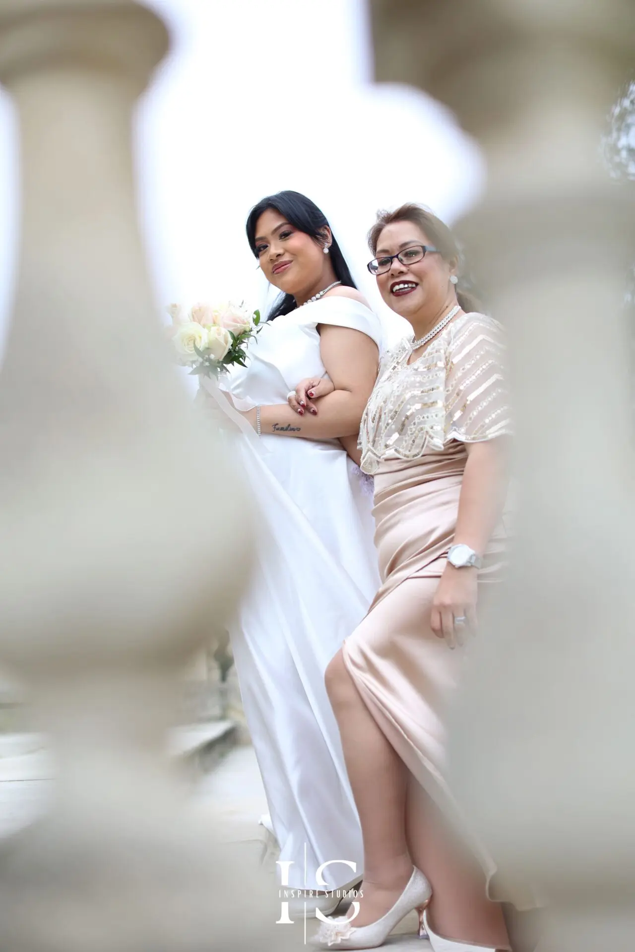 Filipino bride posing for natural wedding portraits photographed by a female photographer in Bexley.