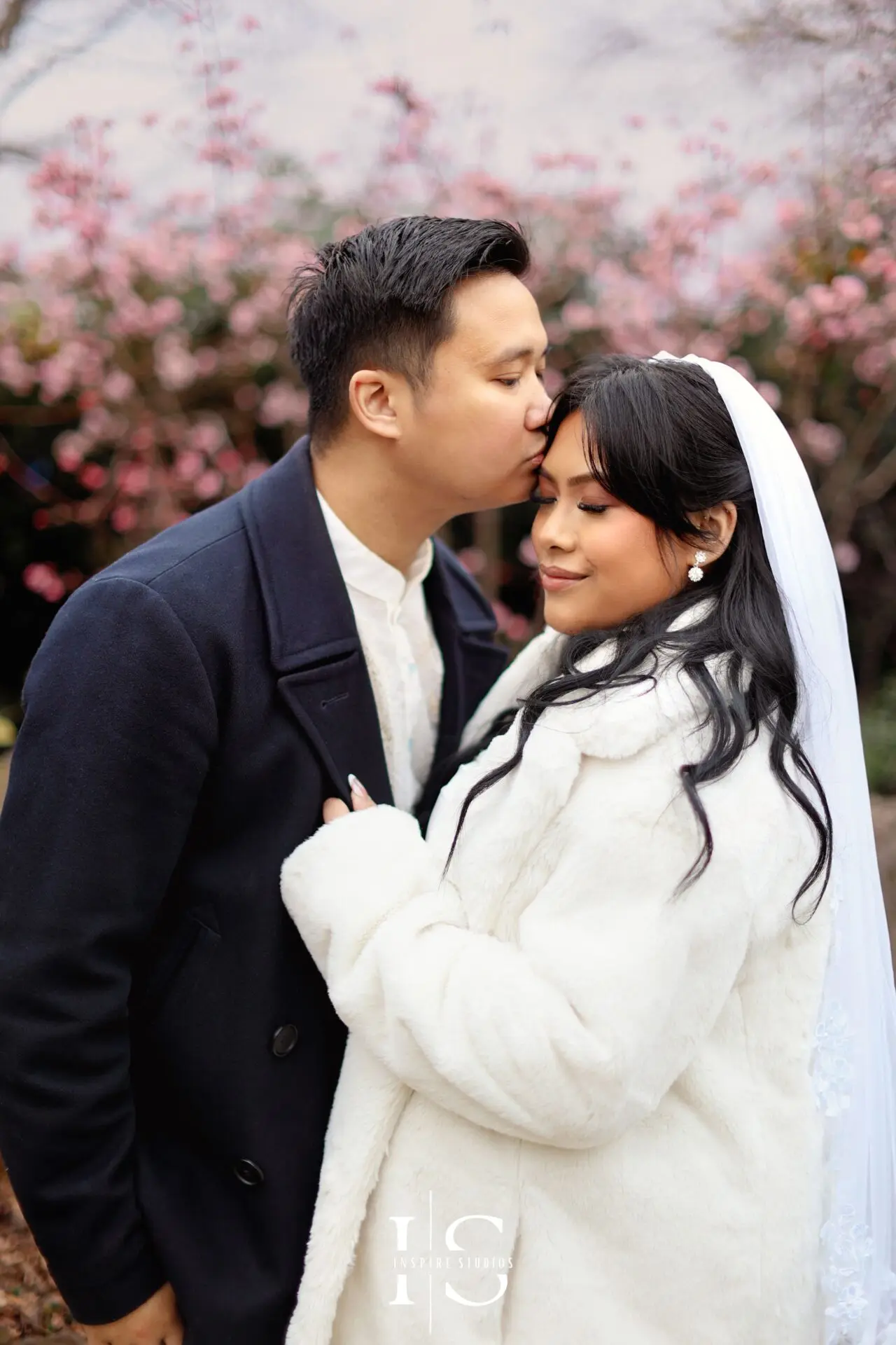 Filipino bride and groom photographed together during an outdoor couple photoshoot at Danson Park in Bexley.