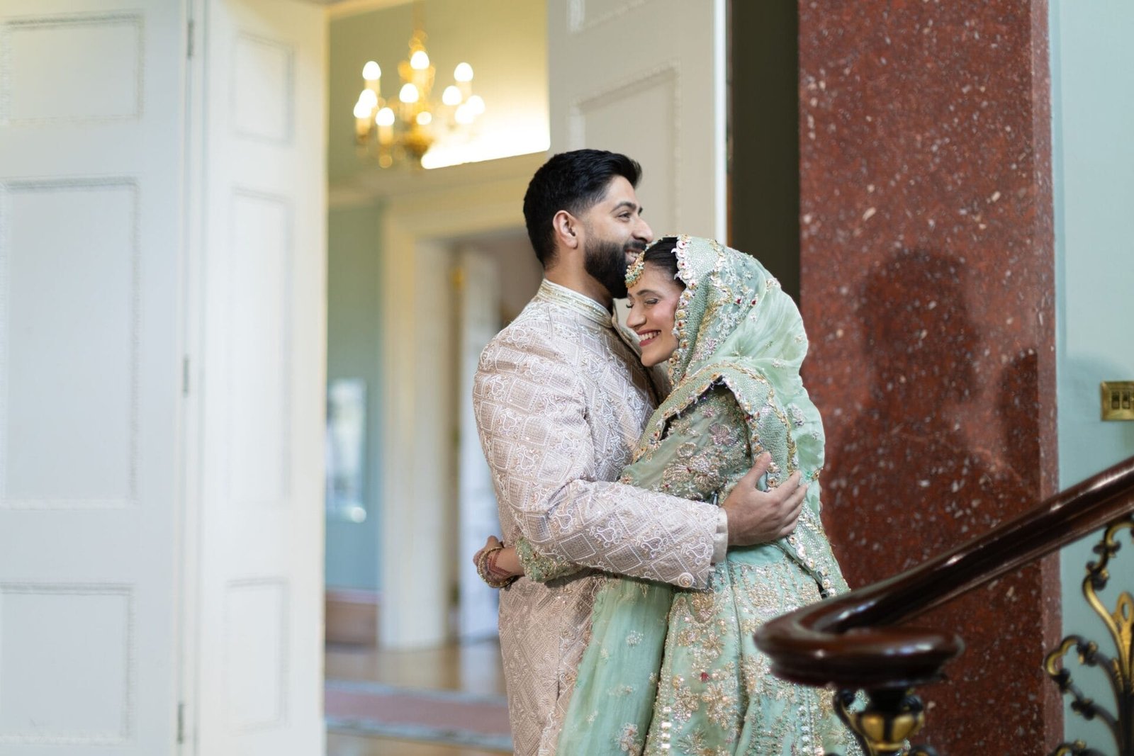 Bride and groom sharing their first look at Hylands House, Chelmsford.