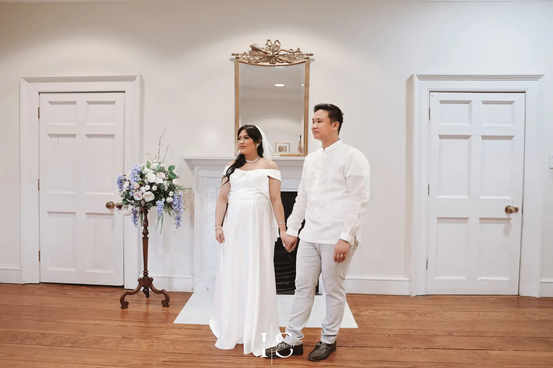 Filipino bride and groom posing together after their registry wedding ceremony at Danson House in Bexley.