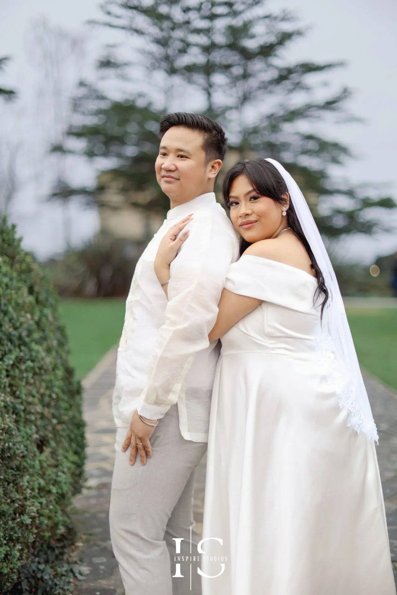 Filipino couple photographed together among the outdoor scenery of Danson Park in Bexley, London.